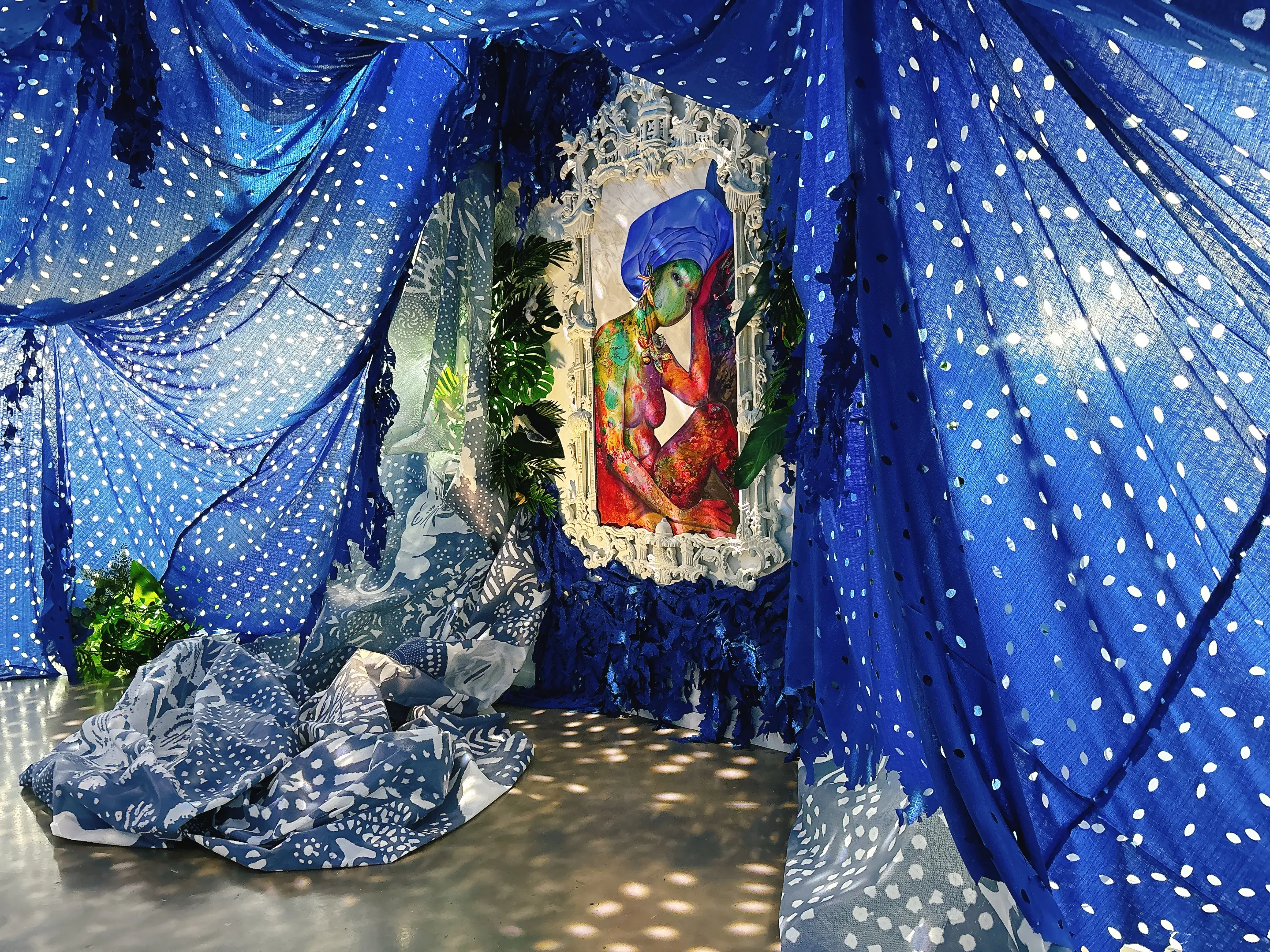 Painting by Firelei Báez in a grotto-like space