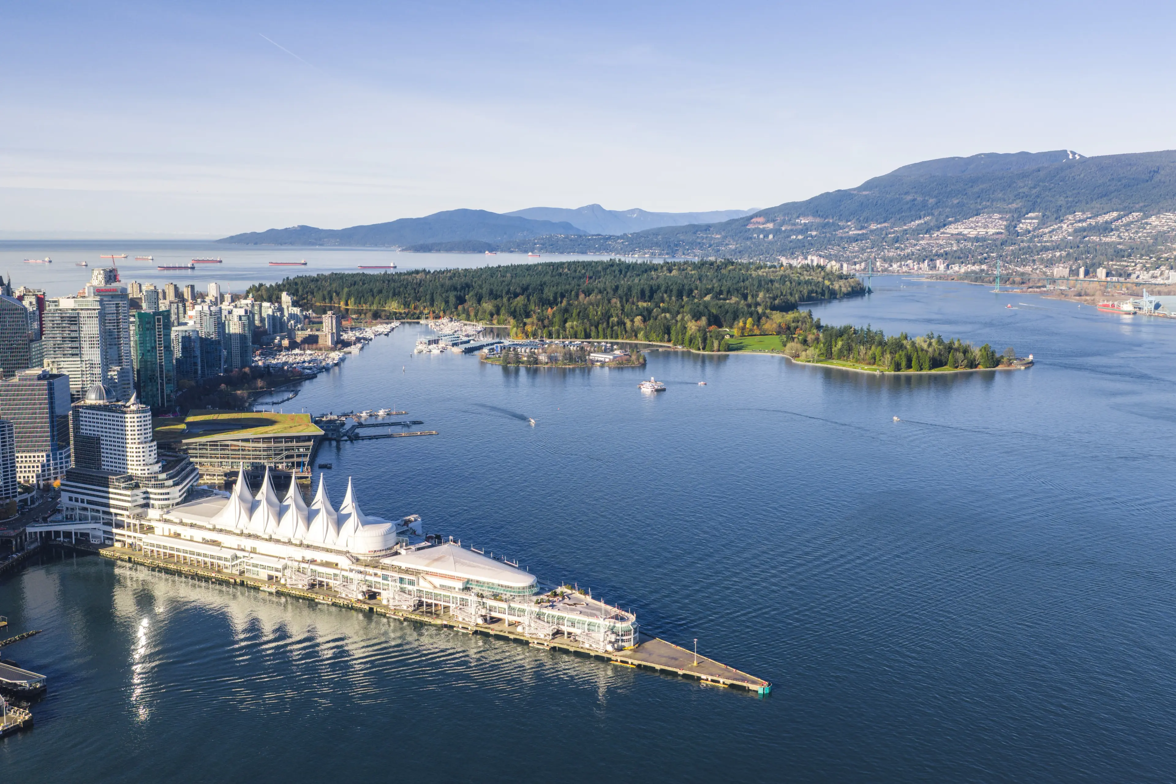 Vancouver city arial with ocean, mountains and skyline.