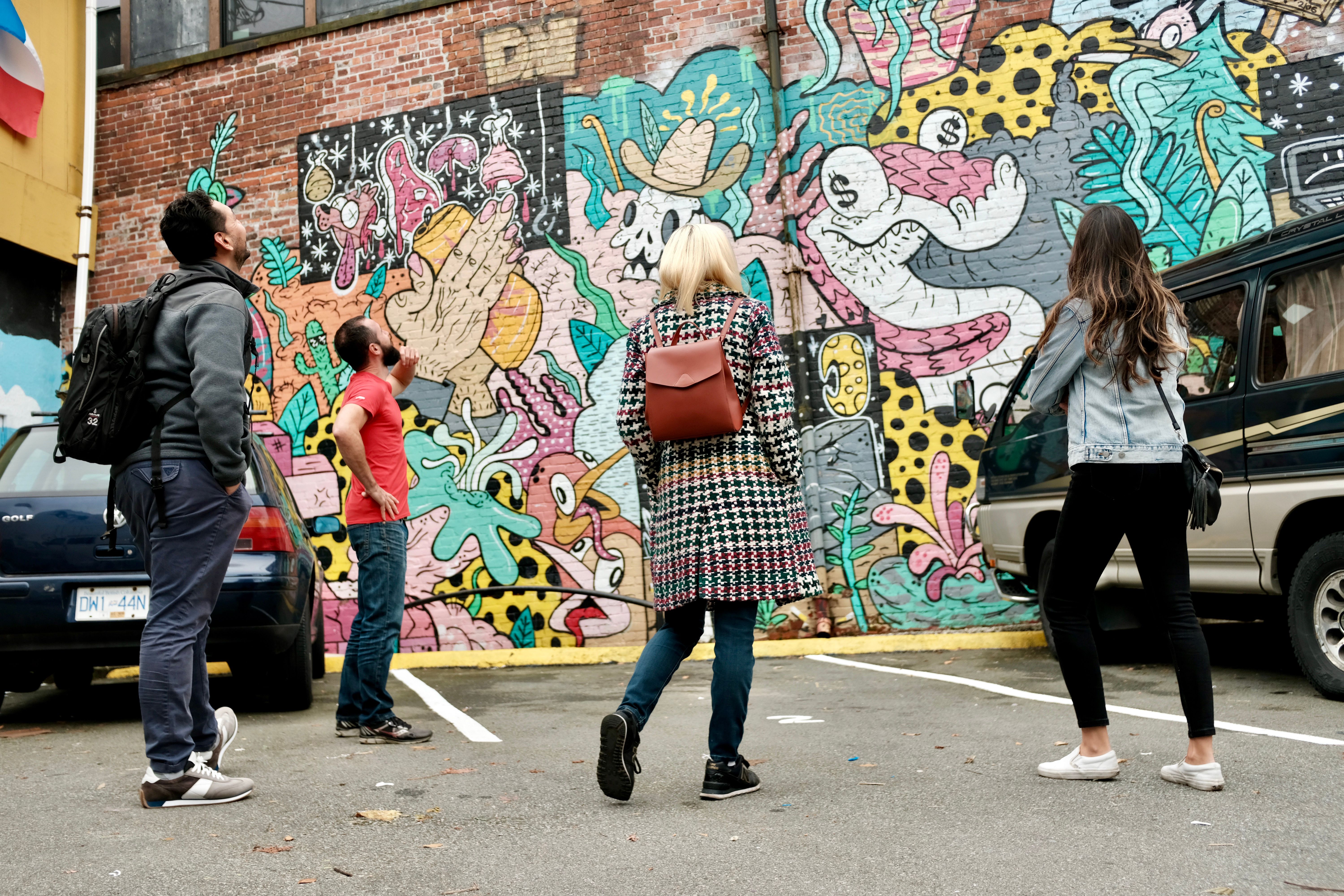 Guests Exploring Mount Pleasant’s Colorful Street Art