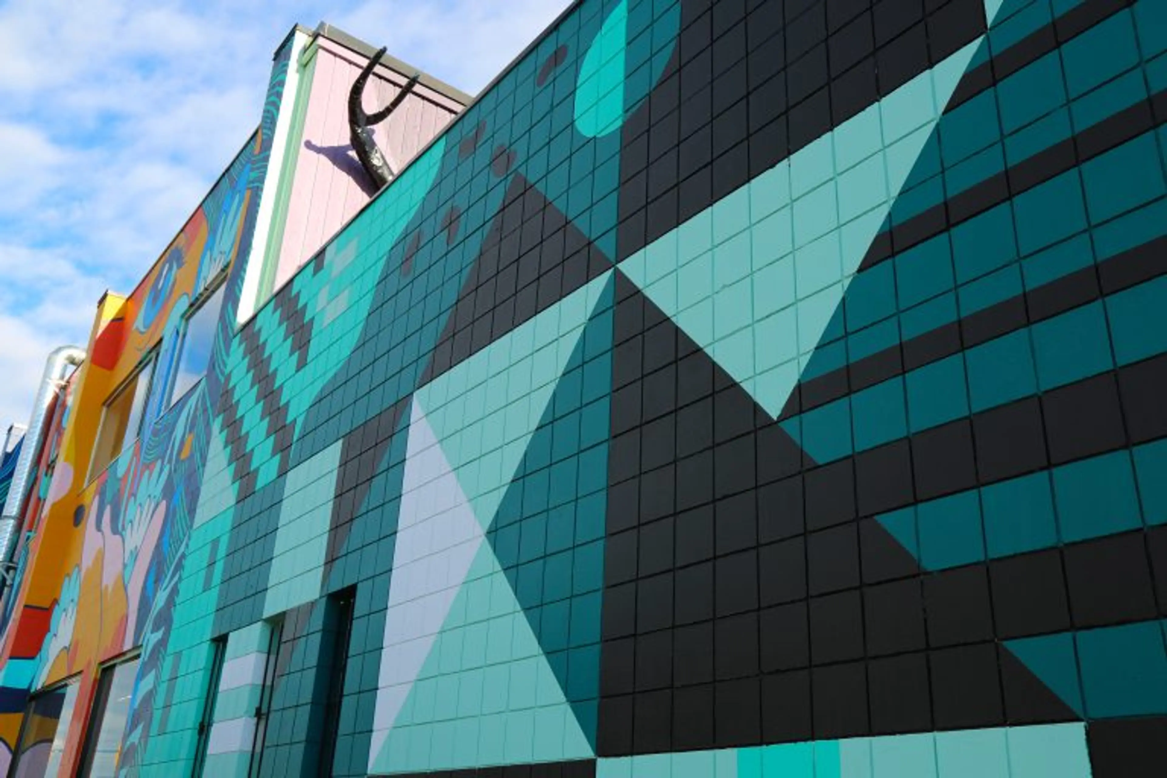 Mural by Tierney Milne, @tierneymilne and Colin Moore, @illustratemoore 