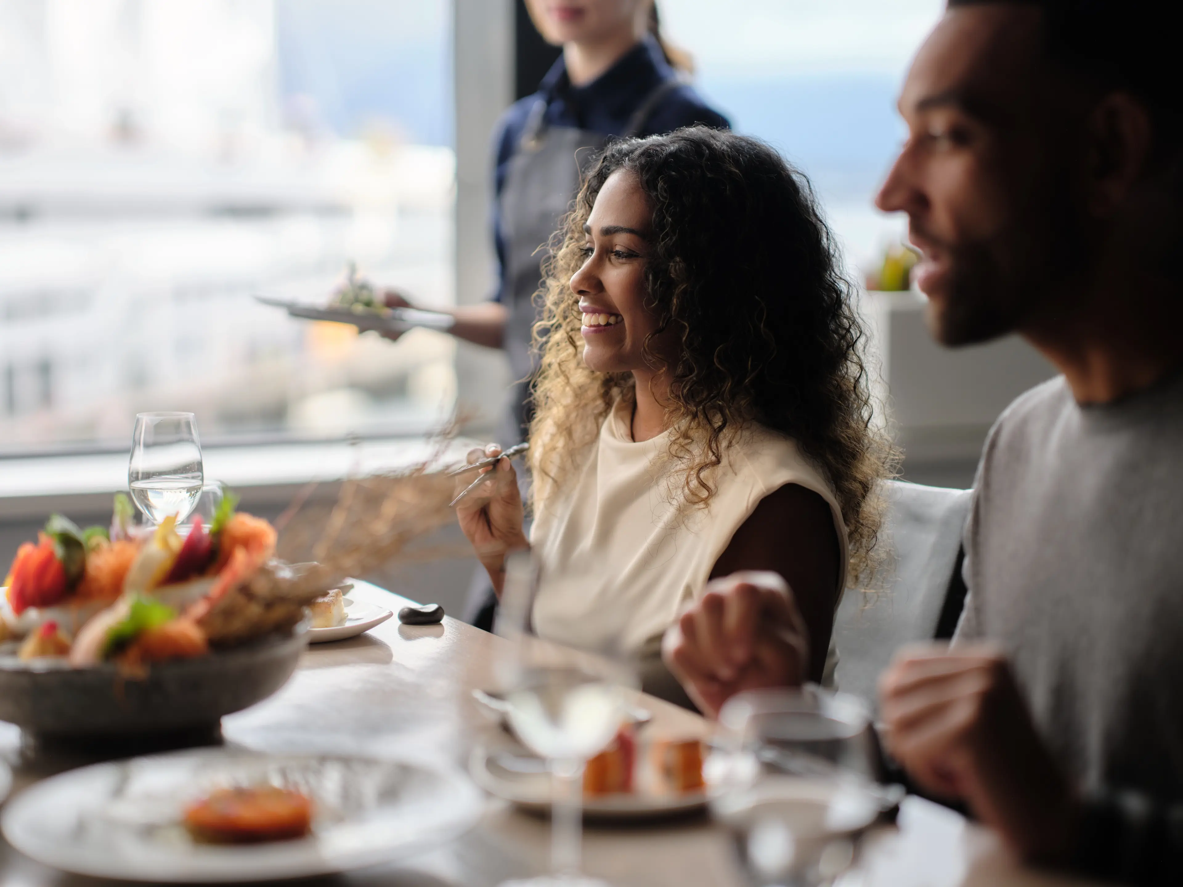 Two people dining in a restaurant in Vancouver.