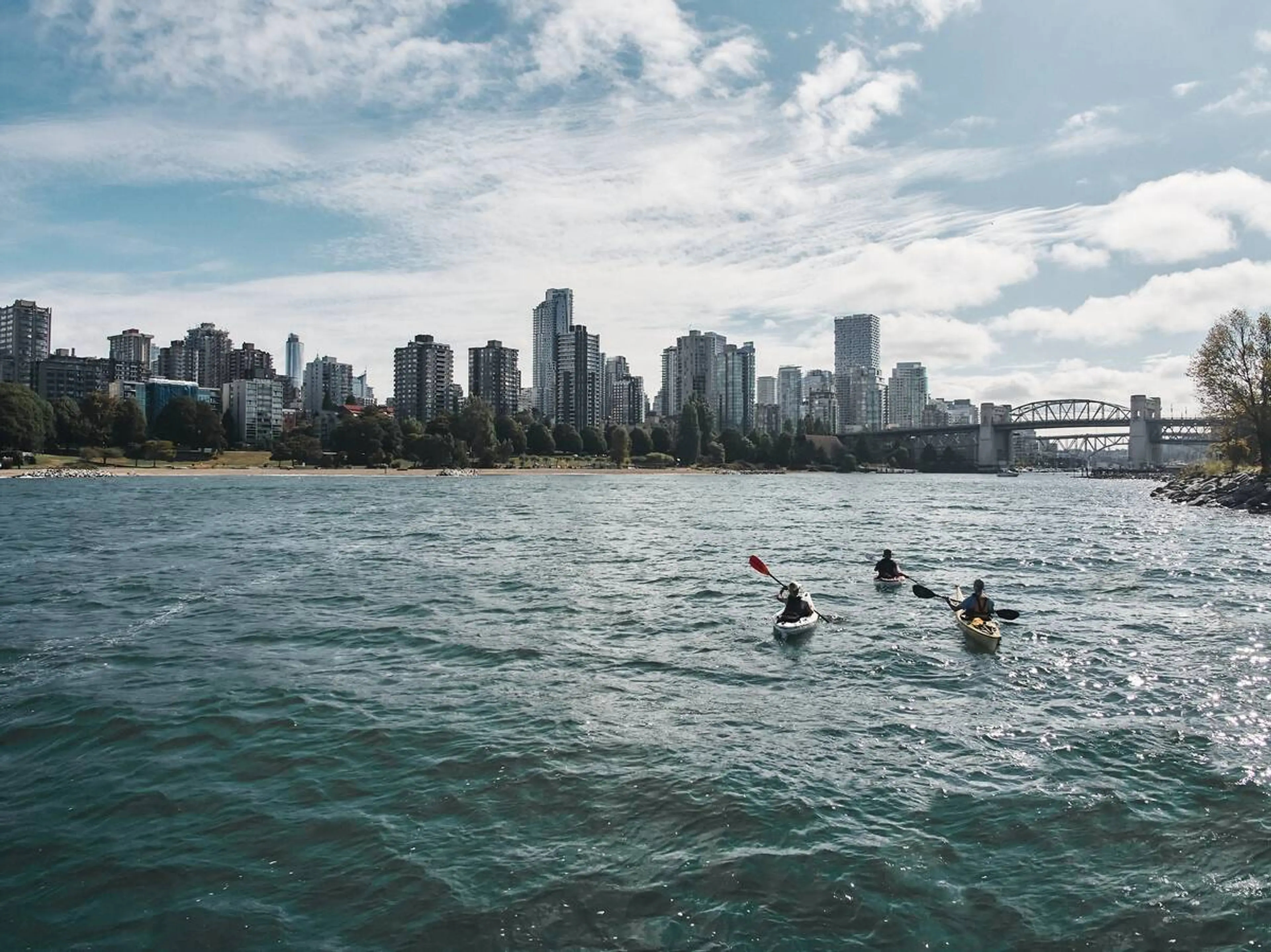 A group of kayakers in False Creek