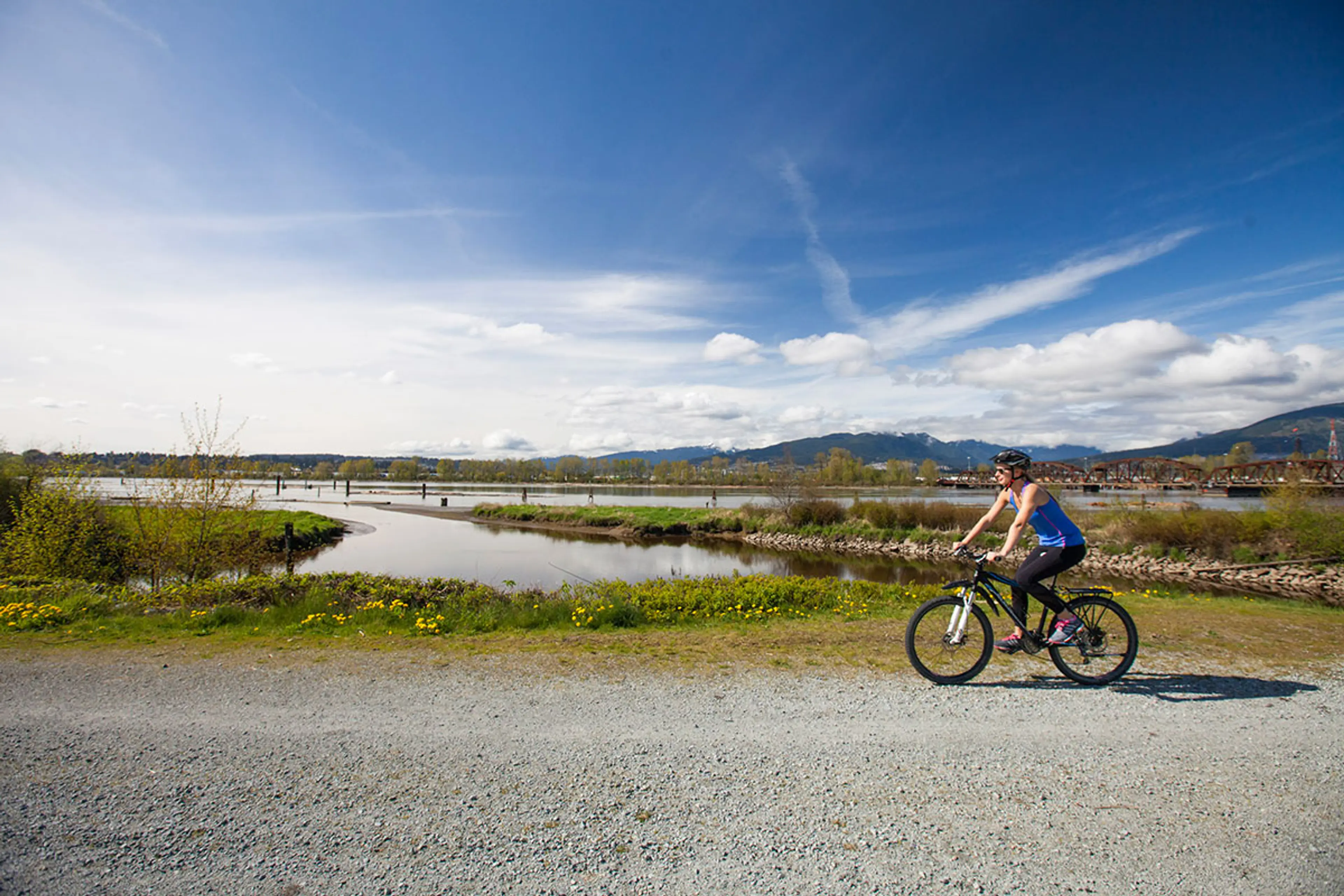 Cycling on the Pitt River Greenway in Vancouver