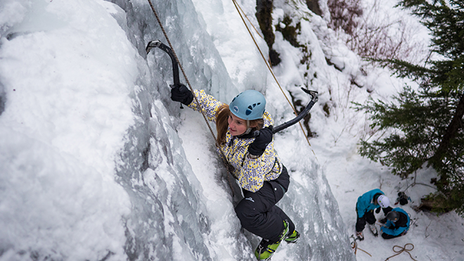 A woman ice climbing near Whistler