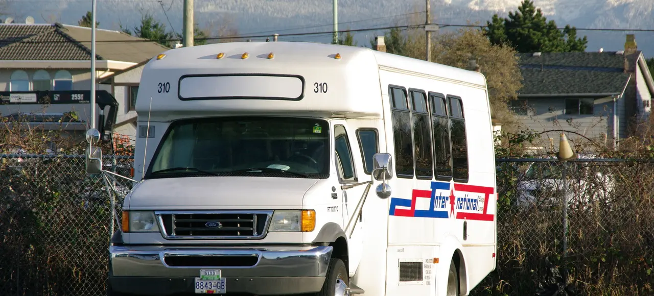 20 Passenger Mini Coach for small groups, families, and shuttles.