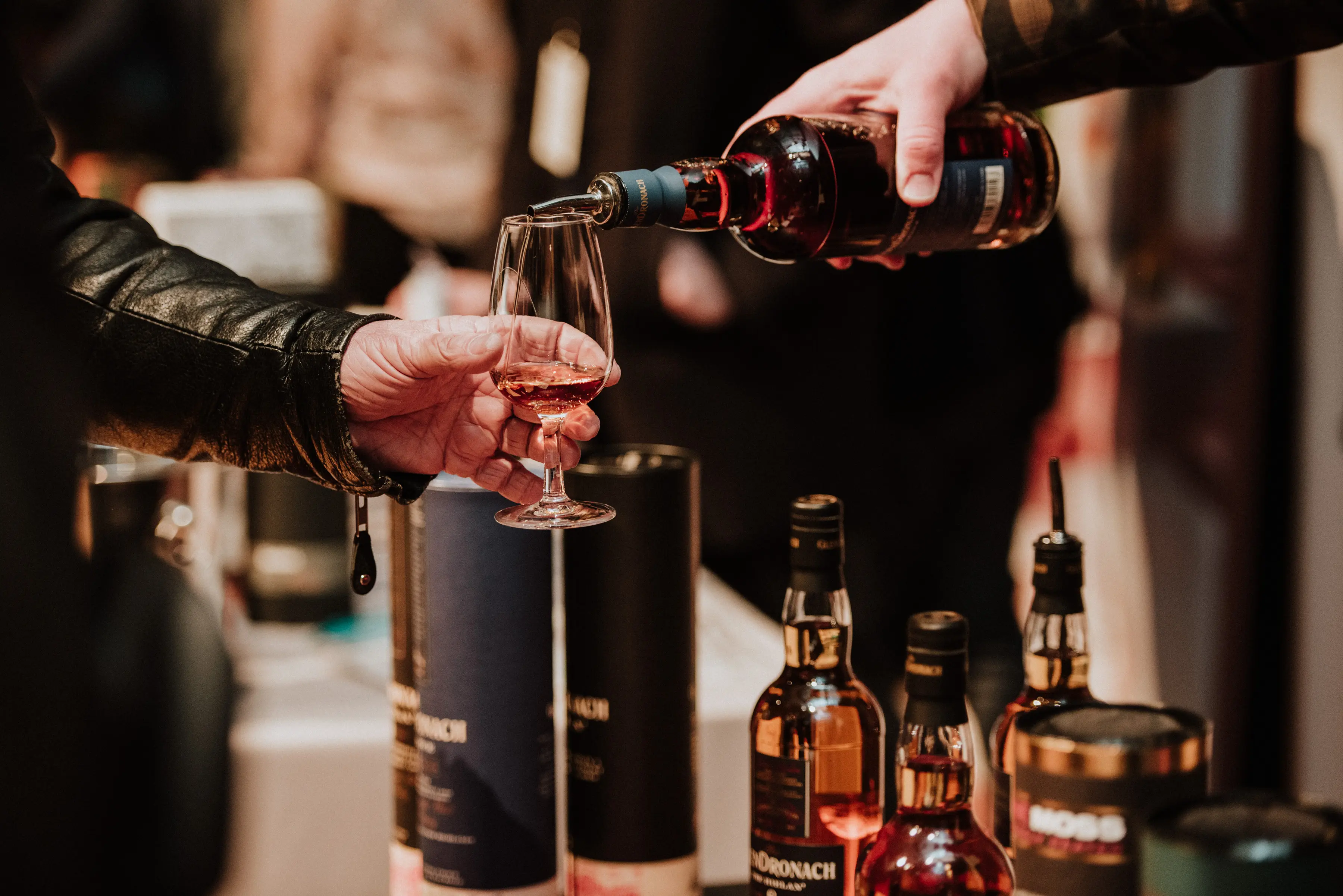 Pouring whiskies at Whisky & Words