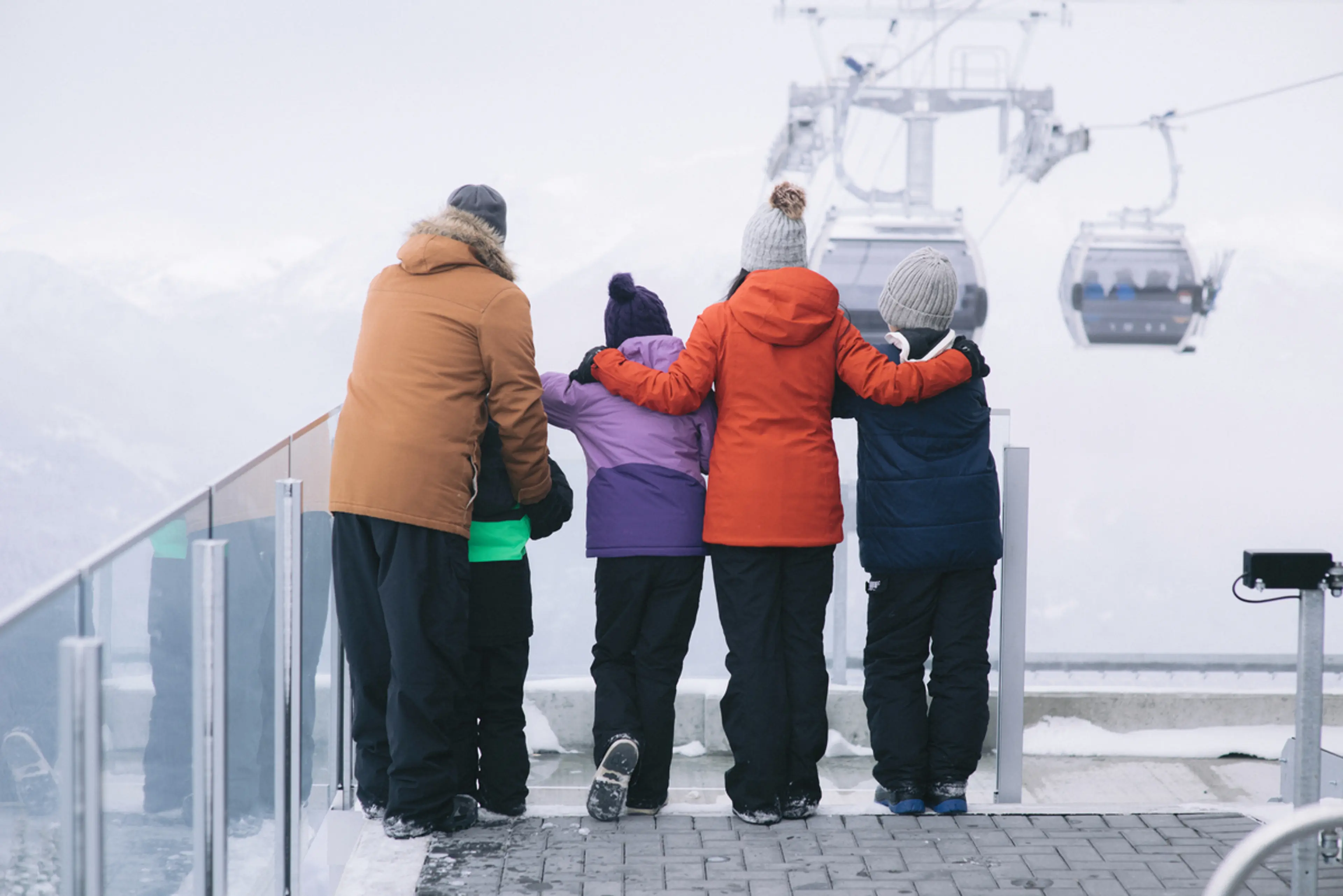 A family at the gondola platform at Whislter Mountain near Vancouve