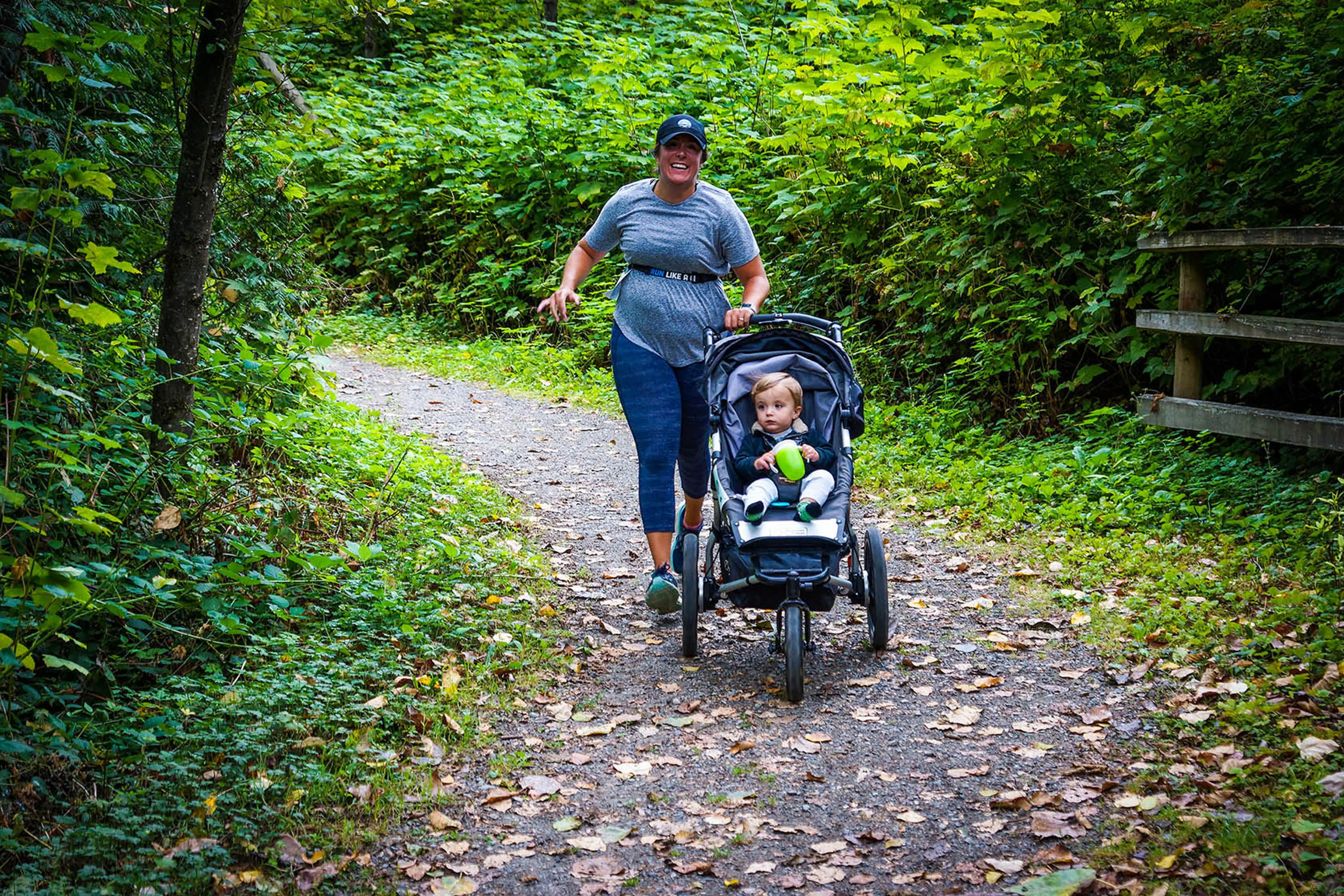 A woman runs with a stroller at the Gruesome Twosome Trail race near Vancouver.