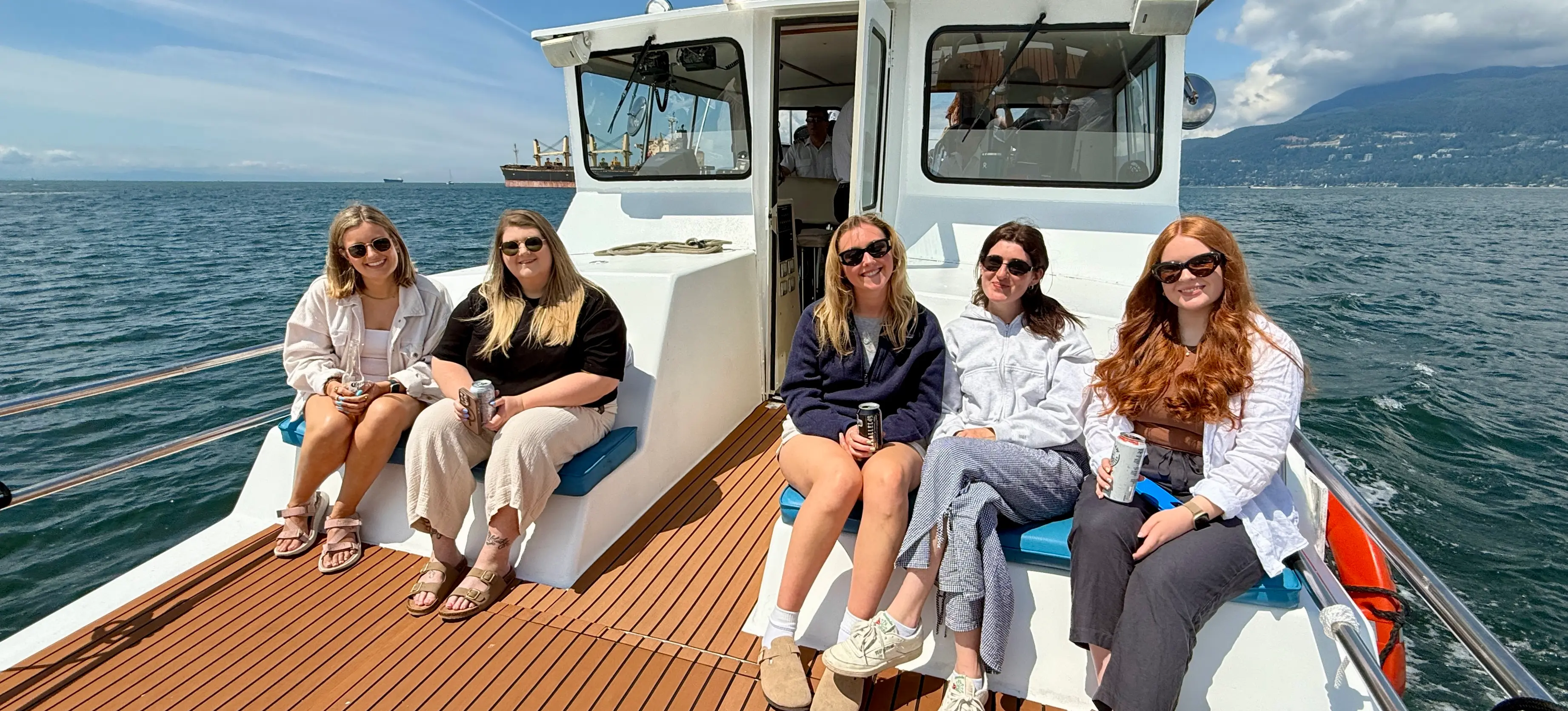 Customers sitting on the bow deck enjoying the views