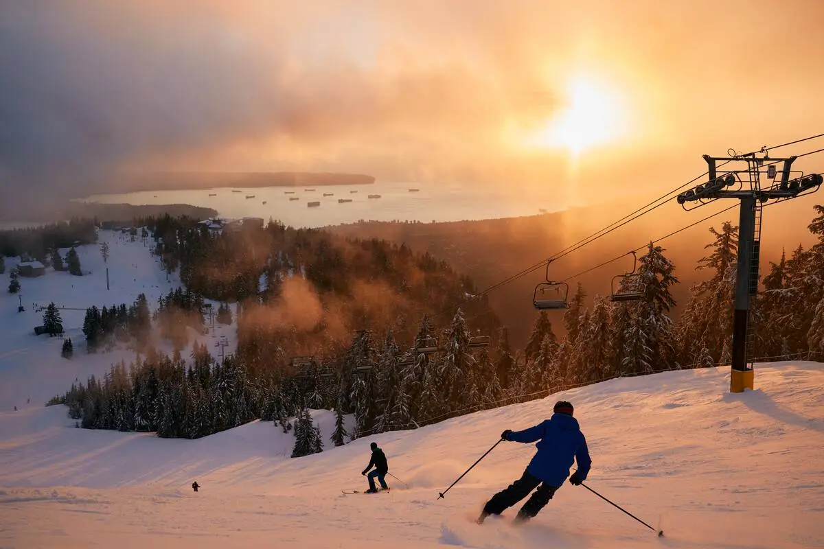 Skiing at sunset on Grouse Mountain