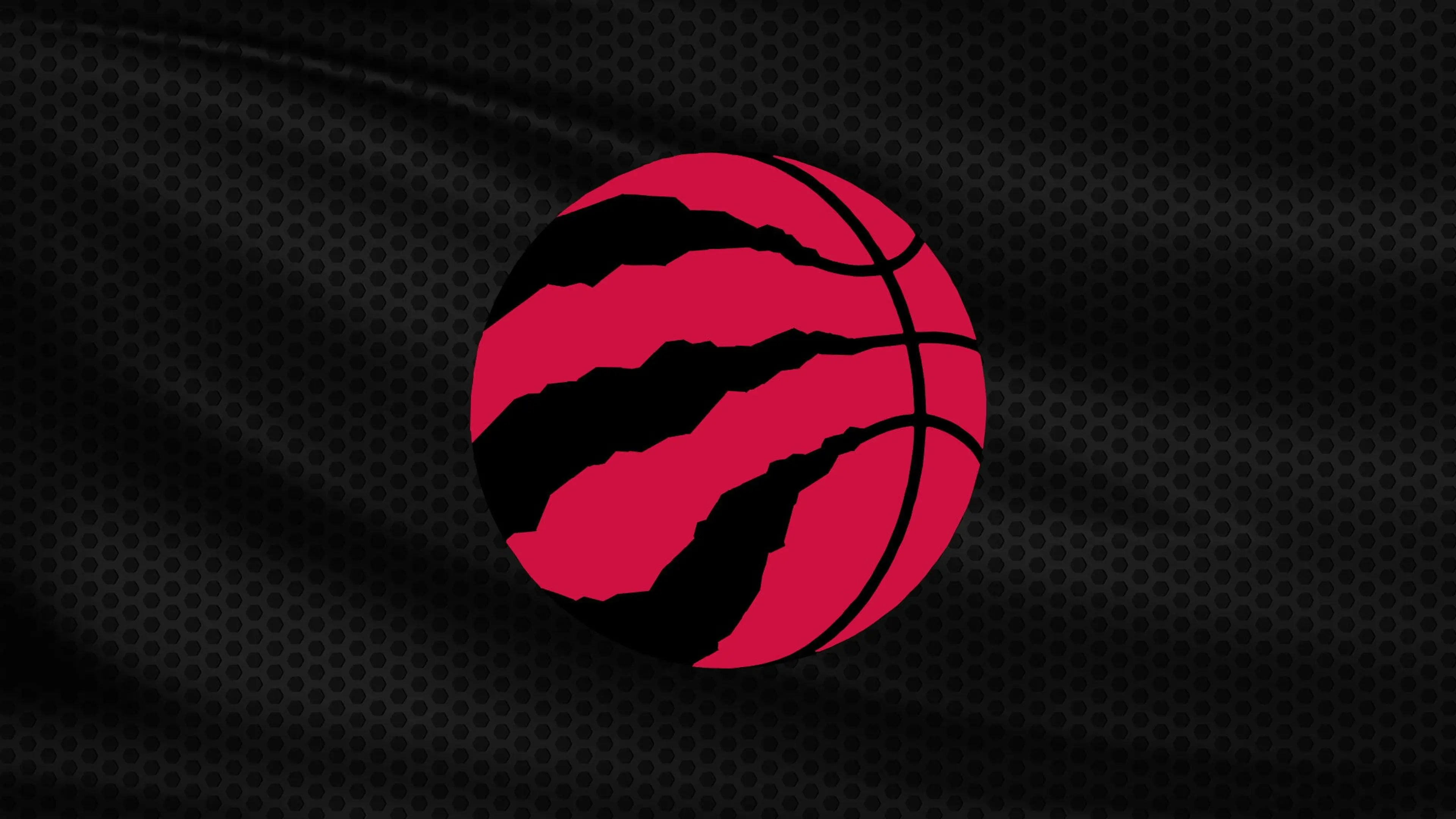 Red basketball with black claw marks on a black textured background
