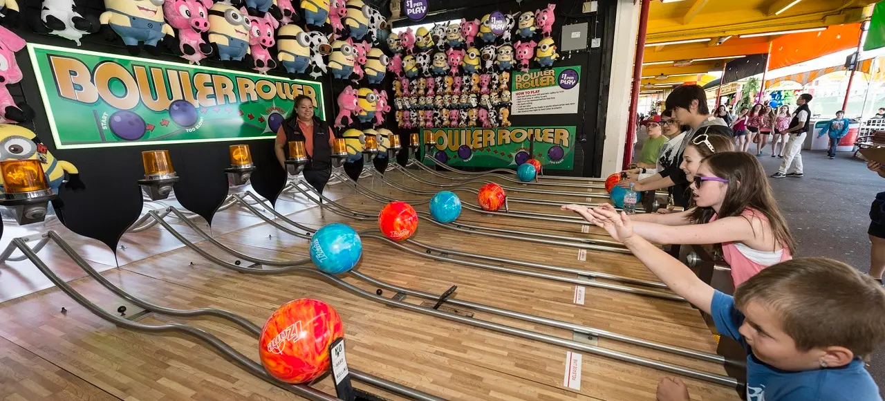 Play a game in Playland's Midway