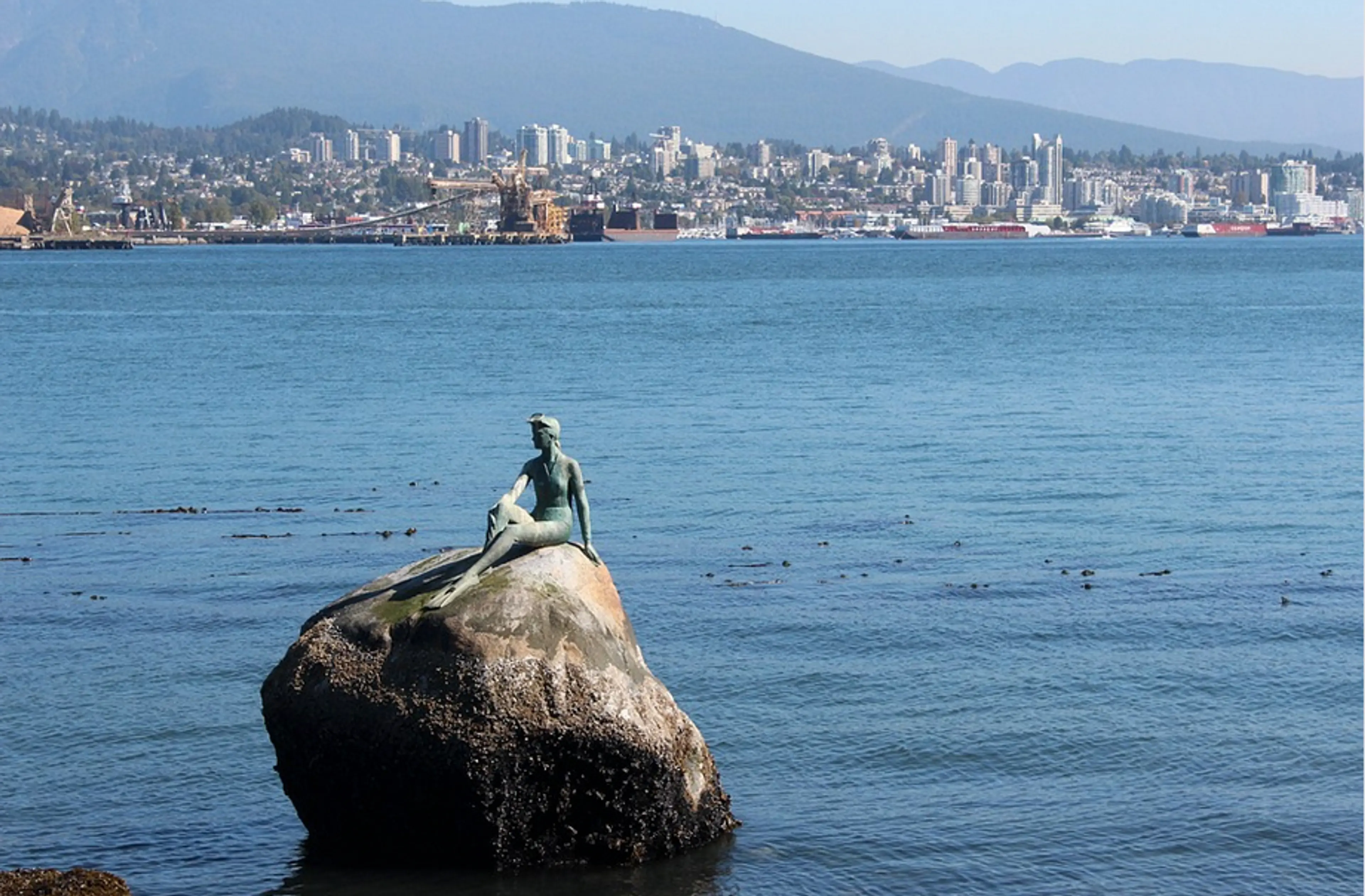 Girl in a wetsuit sculpture in Vancouver