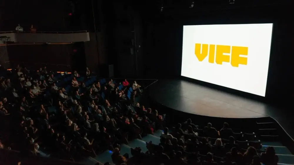 Inside a theatre showing VIFF on the screen