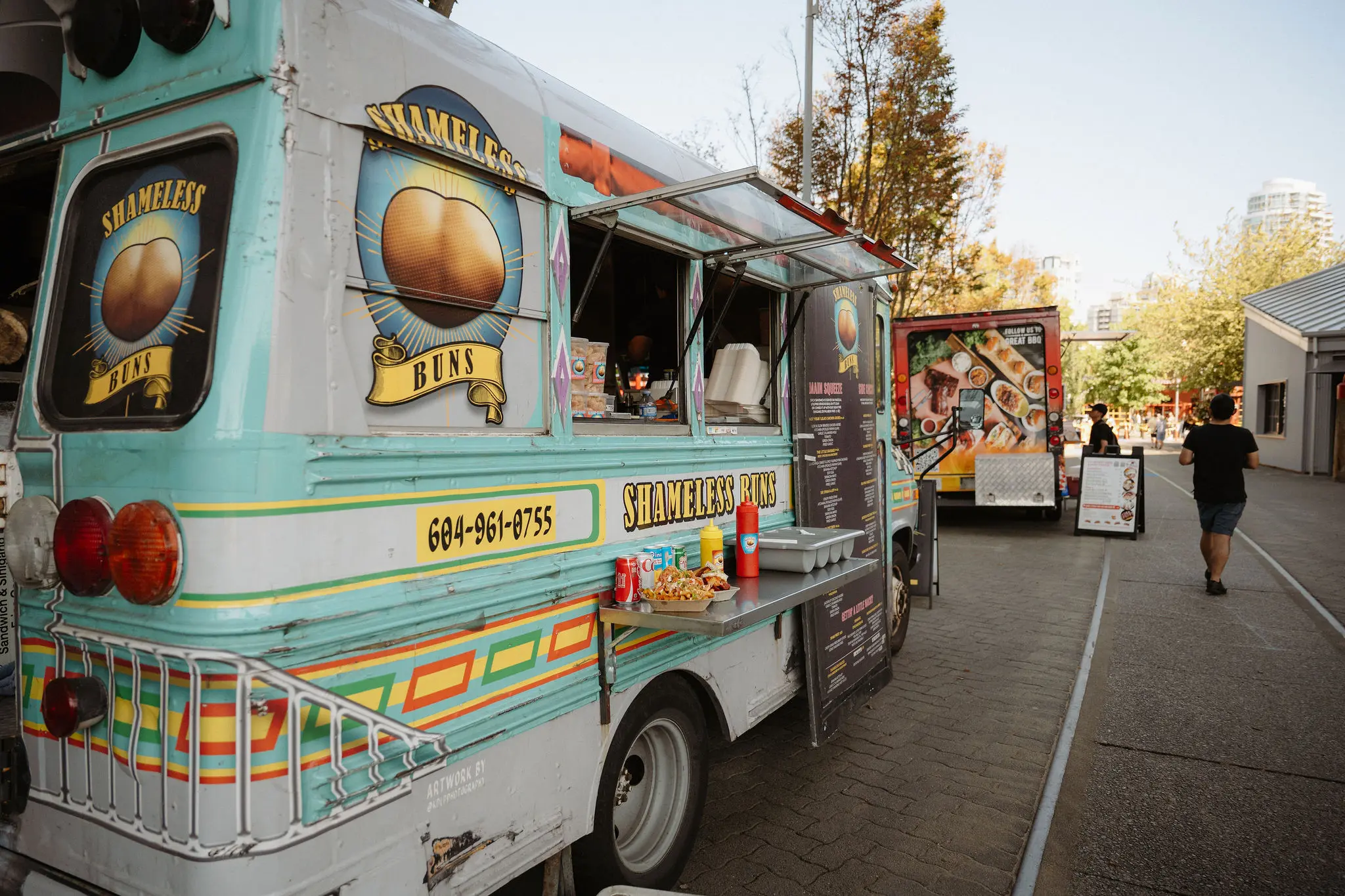 Shameless Buns food truck in Vancouver, creatively converted from a school bus, serving Filipino fusion street food.