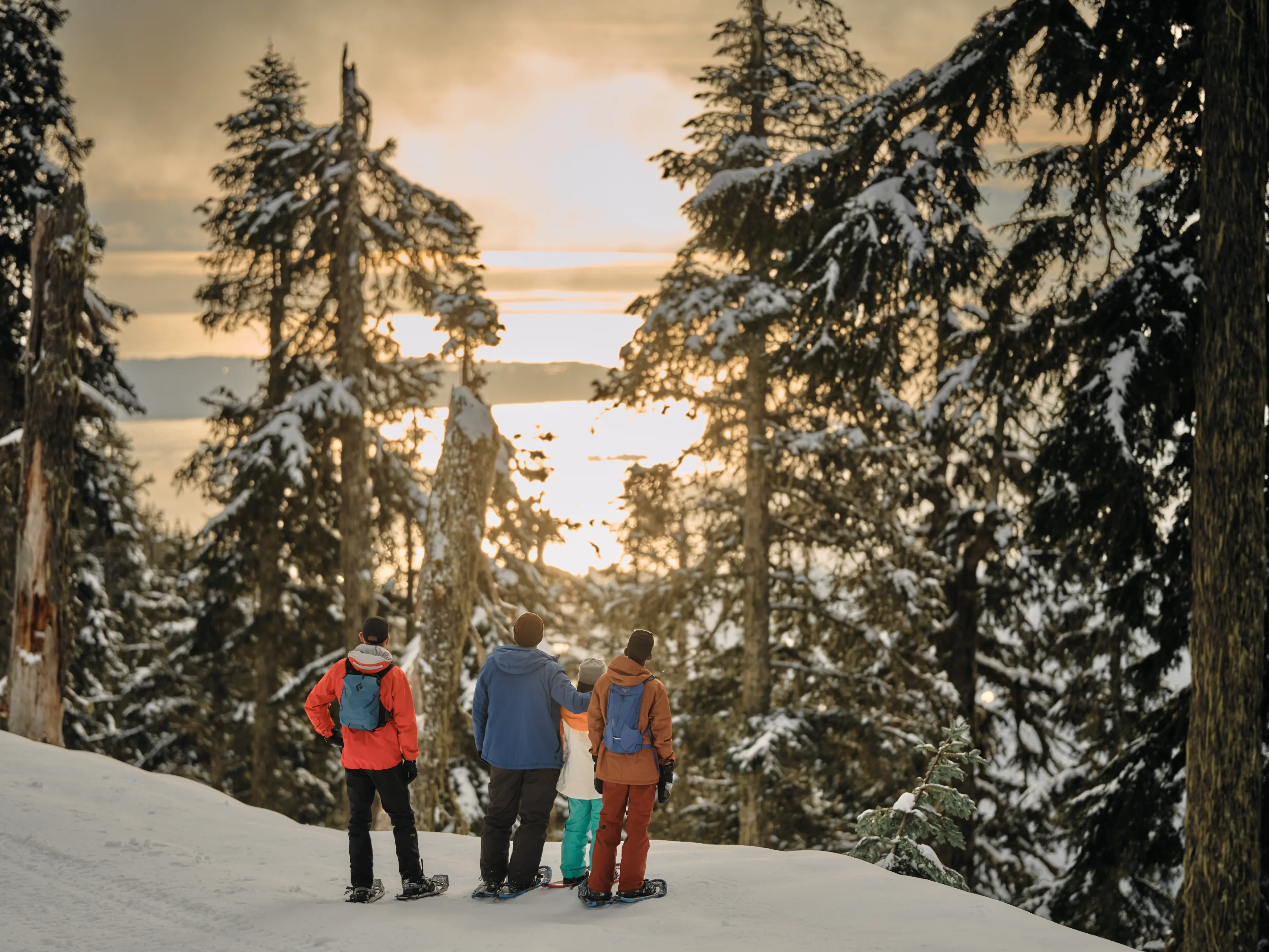 Three people snowshoeing at Grouse Mountain