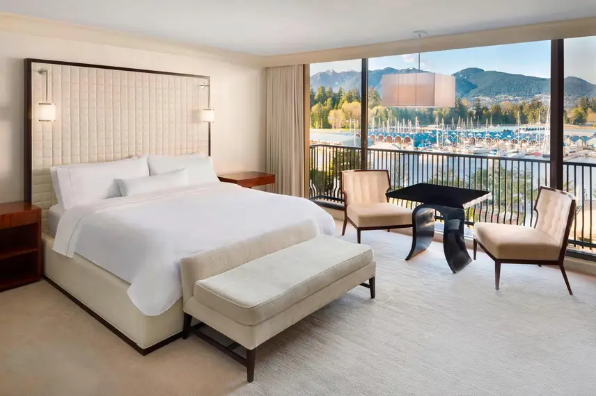 A hotel room at The Westin Bayshore in Vancouver including a few of the harbour and North Shore Mountains.