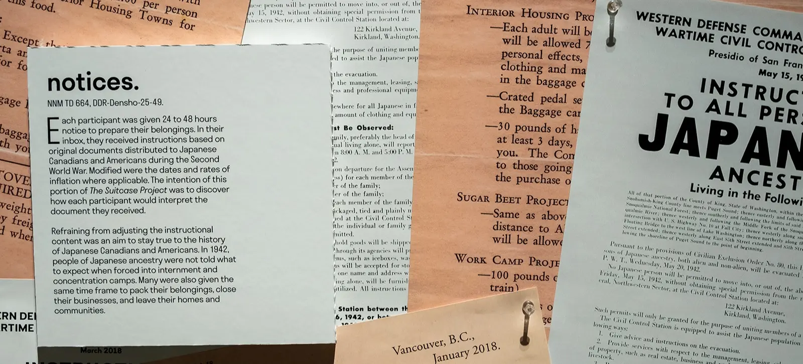 w-1600h-900-00ec86-mov_suitcase_exhibit_063