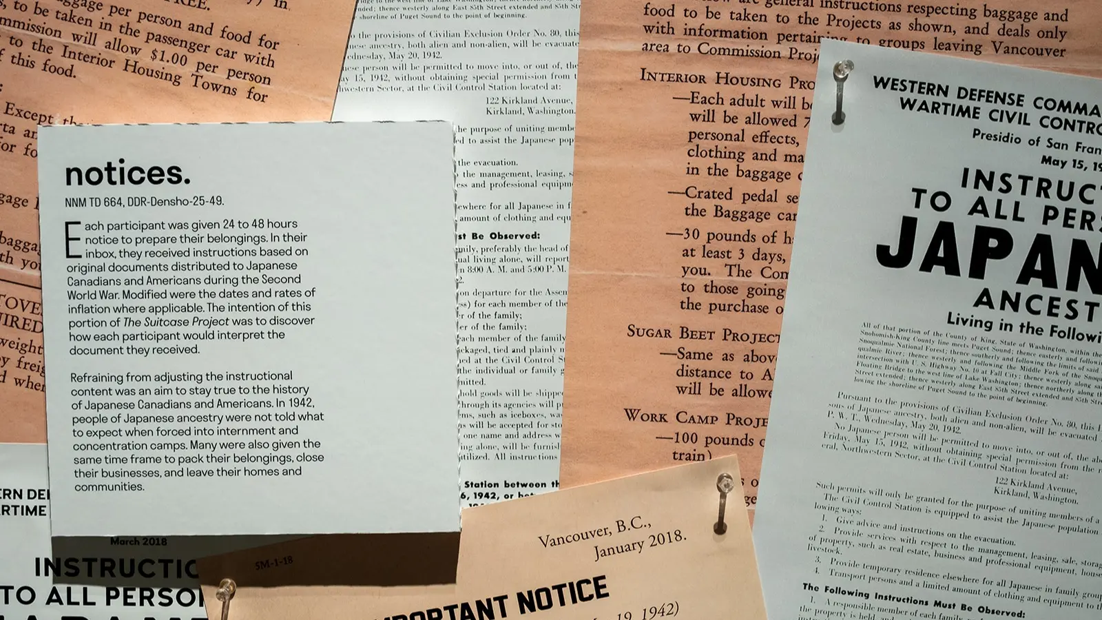 w-1600h-900-00ec86-mov_suitcase_exhibit_063