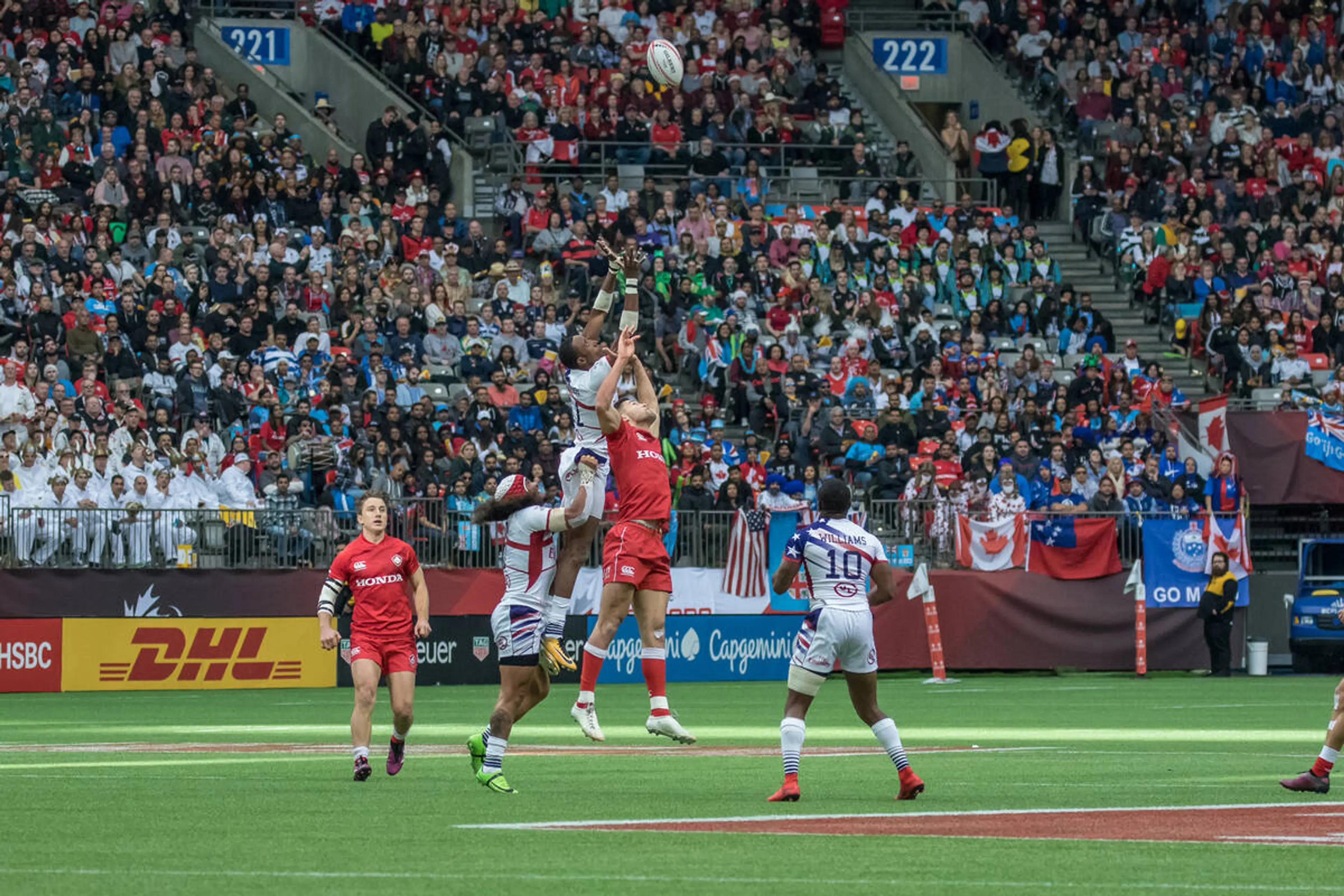 Players jump for the ball at Rugby Sevens in Vancouver. 