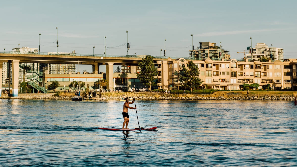 A paddleboarder in False Creek