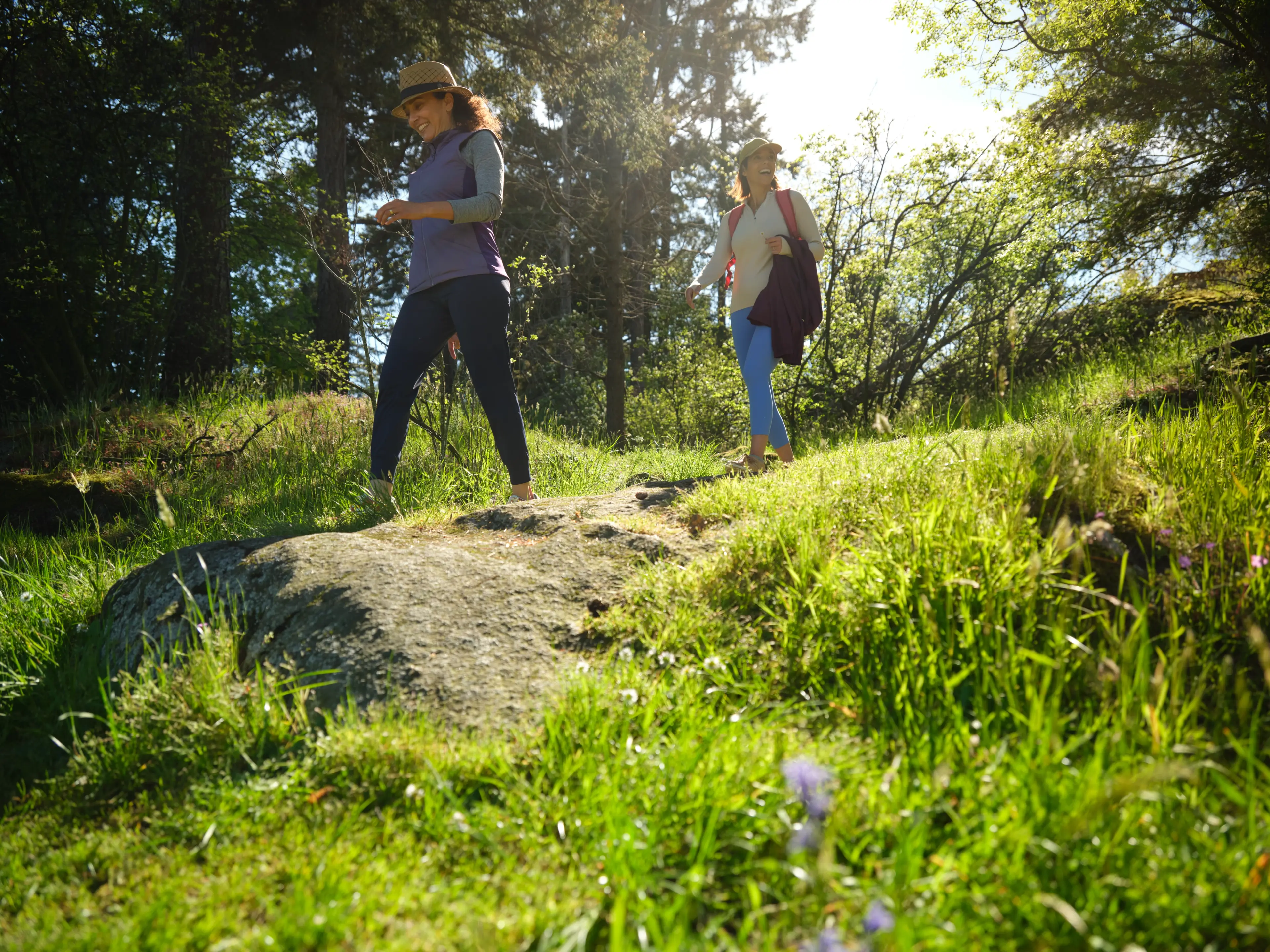 Two women hiking in Lighthouse Park. 