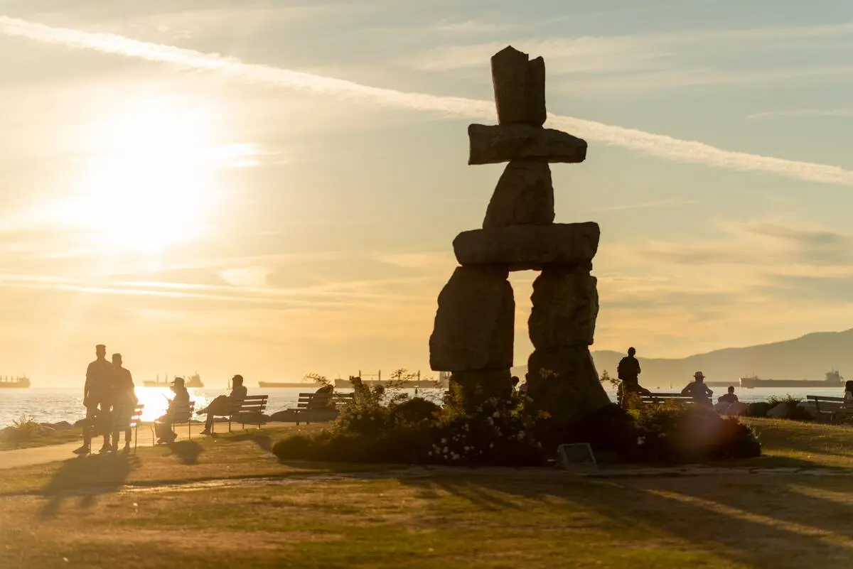 English Bay at sunset with Inukshuk