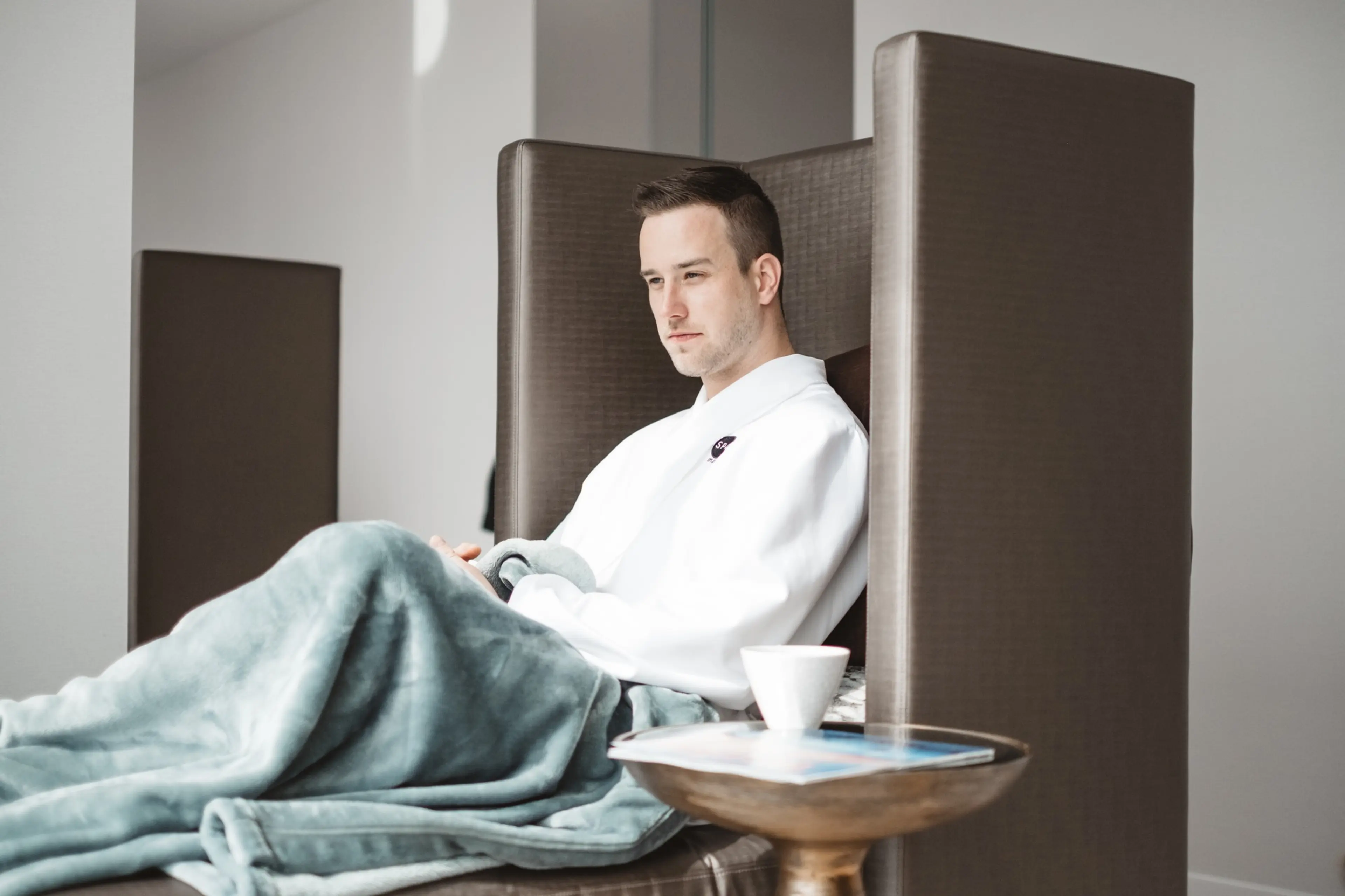 Man relaxing at spa retreat Spa JW Marriott Vancouver