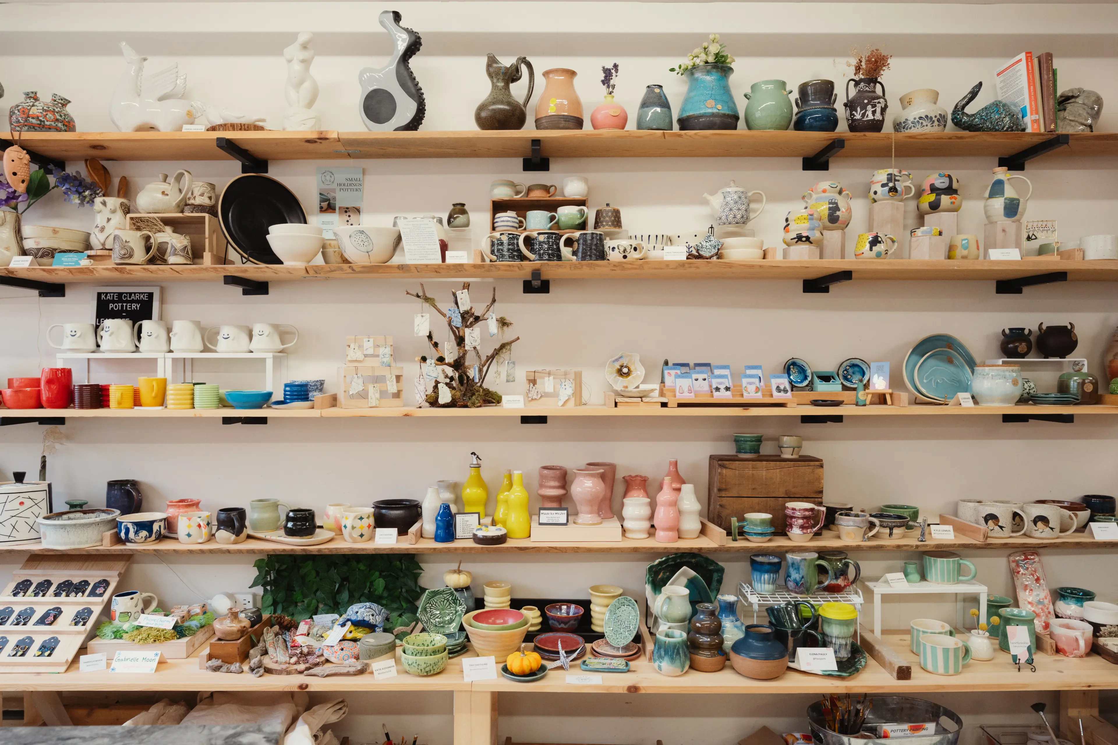 Shop display at Café au Clay Pottery Studio and Café in Vancouver.