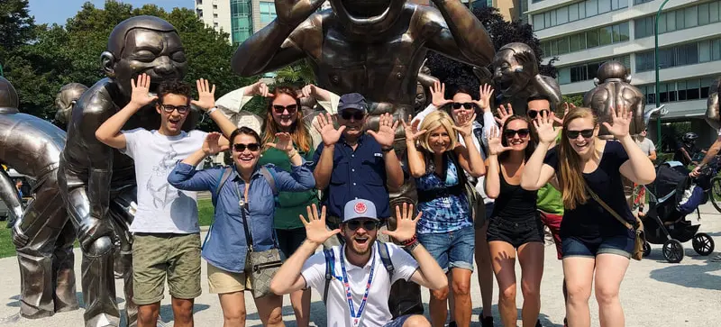 Vancouver Toonie Tours group at the laughing stautes