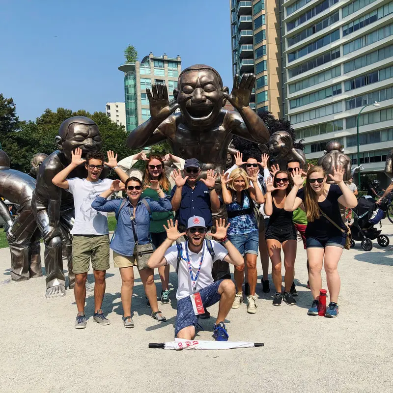 Vancouver Toonie Tours group at the laughing stautes