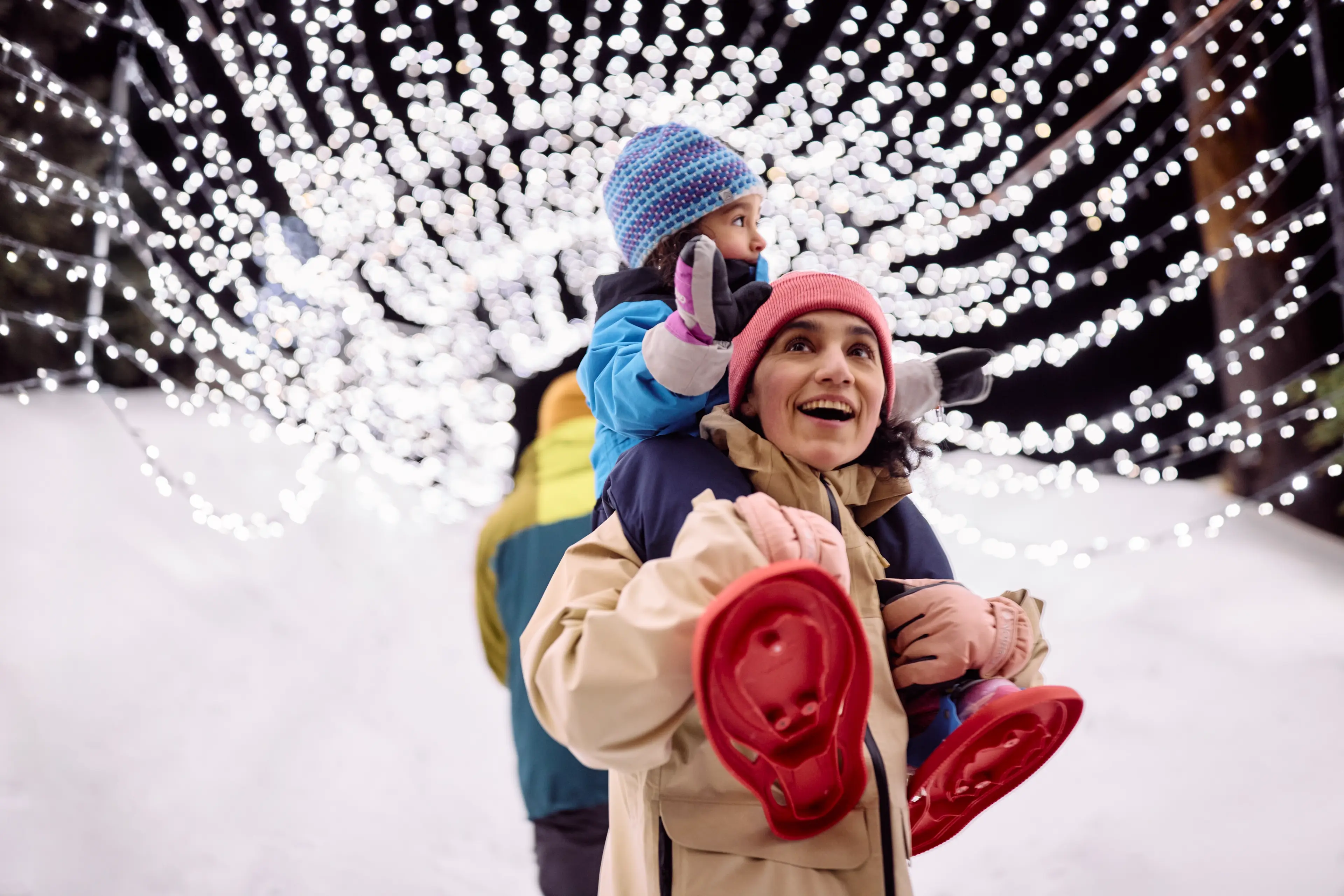 Family doing the Light Walk at Grouse Mountain in Vancouver