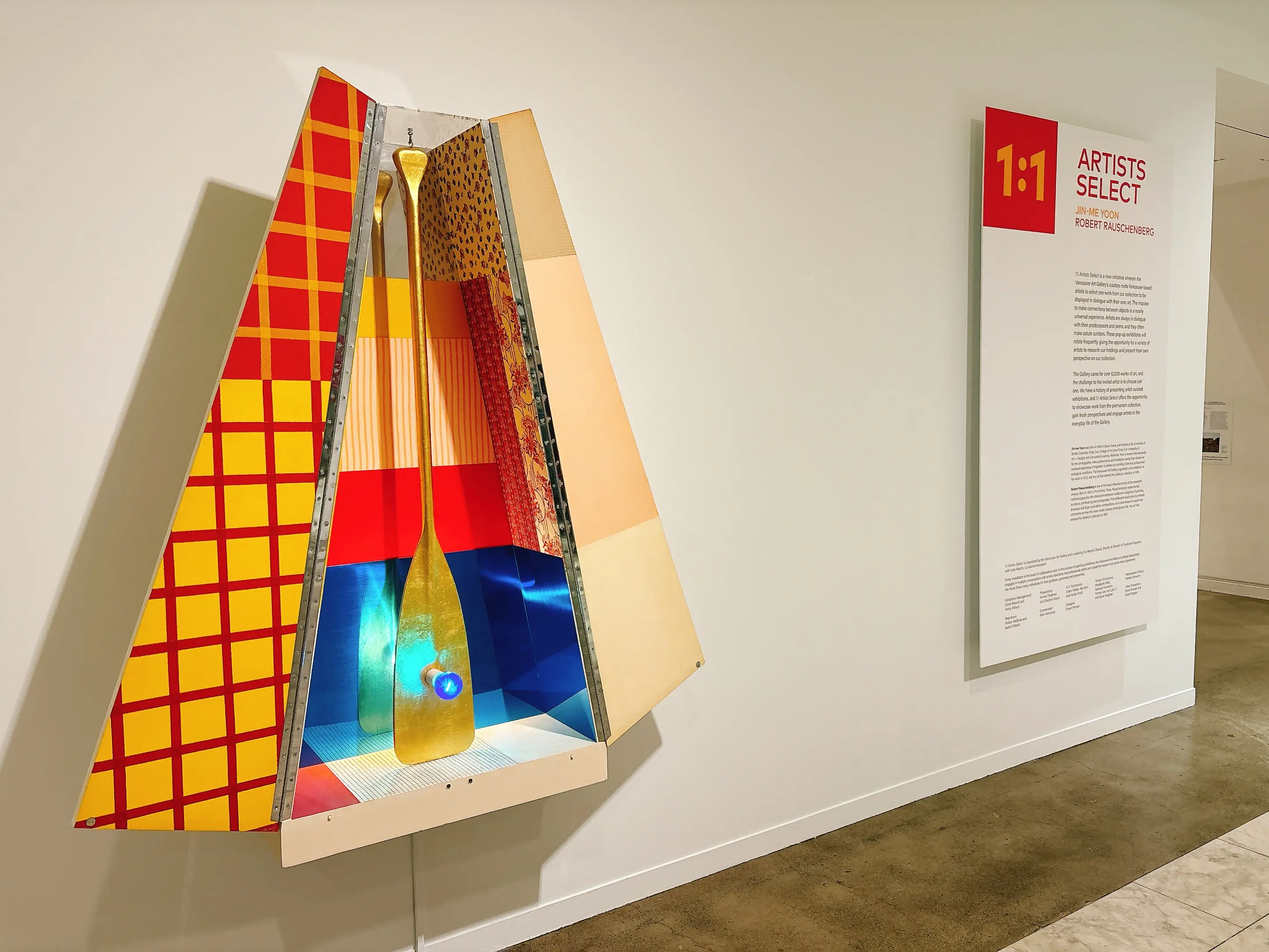 A work by Robert Rauschenberg that uses everyday objects like a paddle and a lightbulb to create a "shrine"