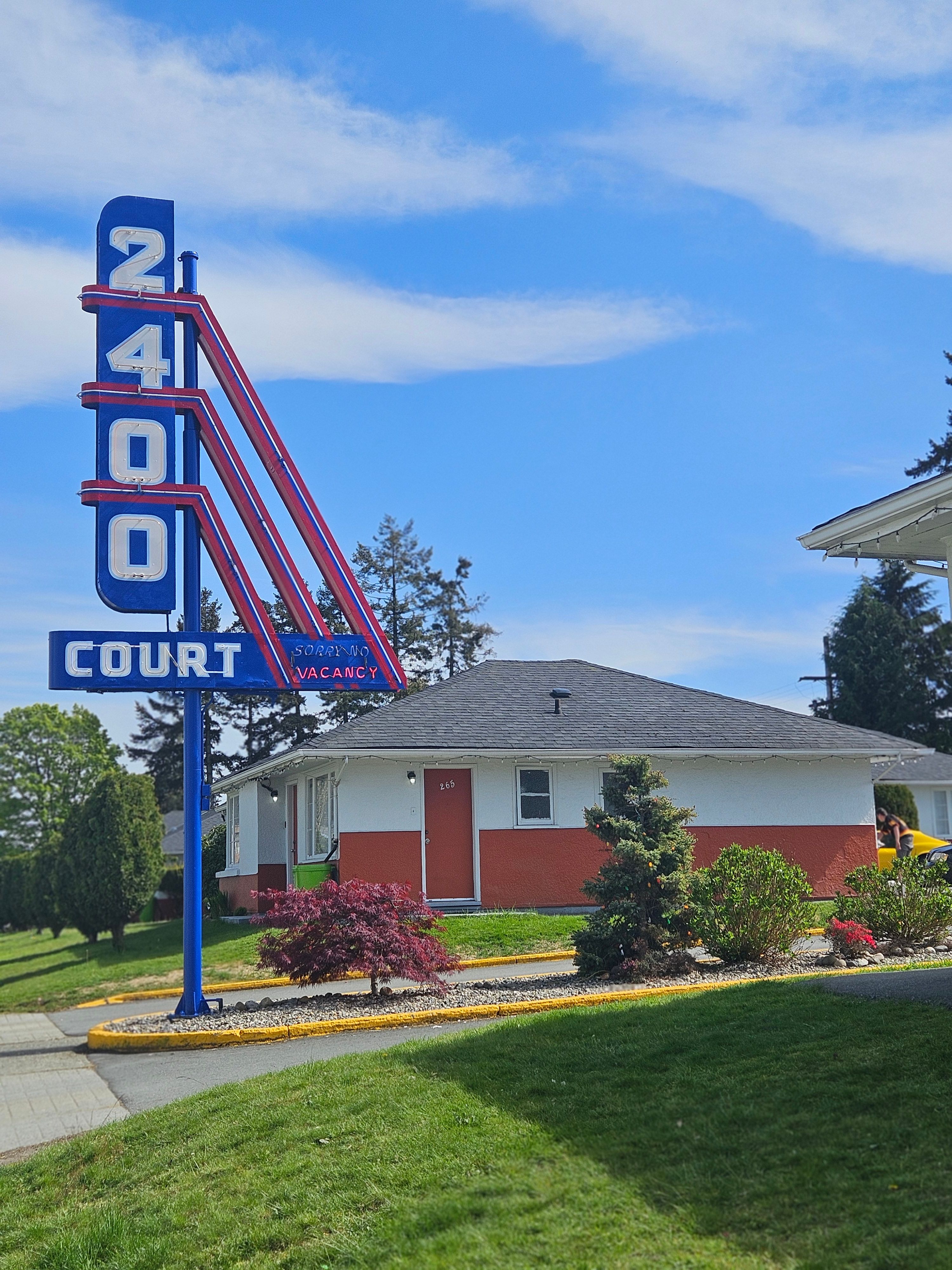 2400 Motel entrance with neon sign