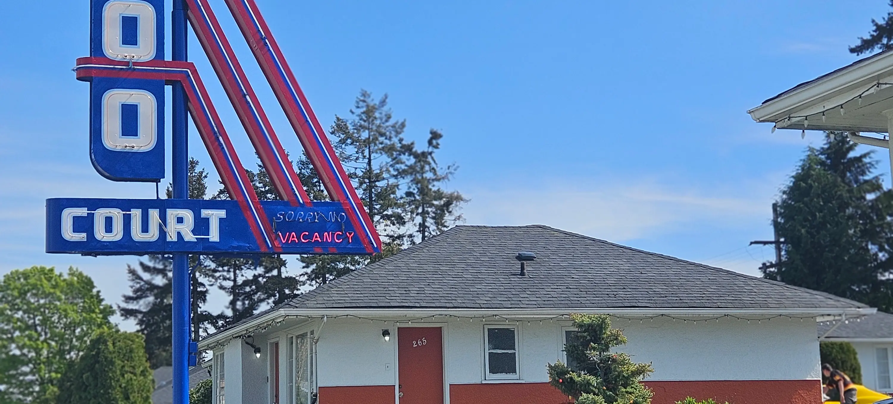 2400 Motel entrance with neon sign