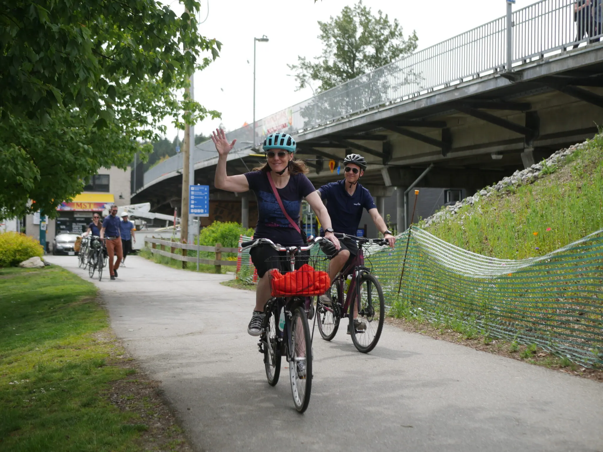 Cyclists ride through Rocky Point Park during Go By Bike Week