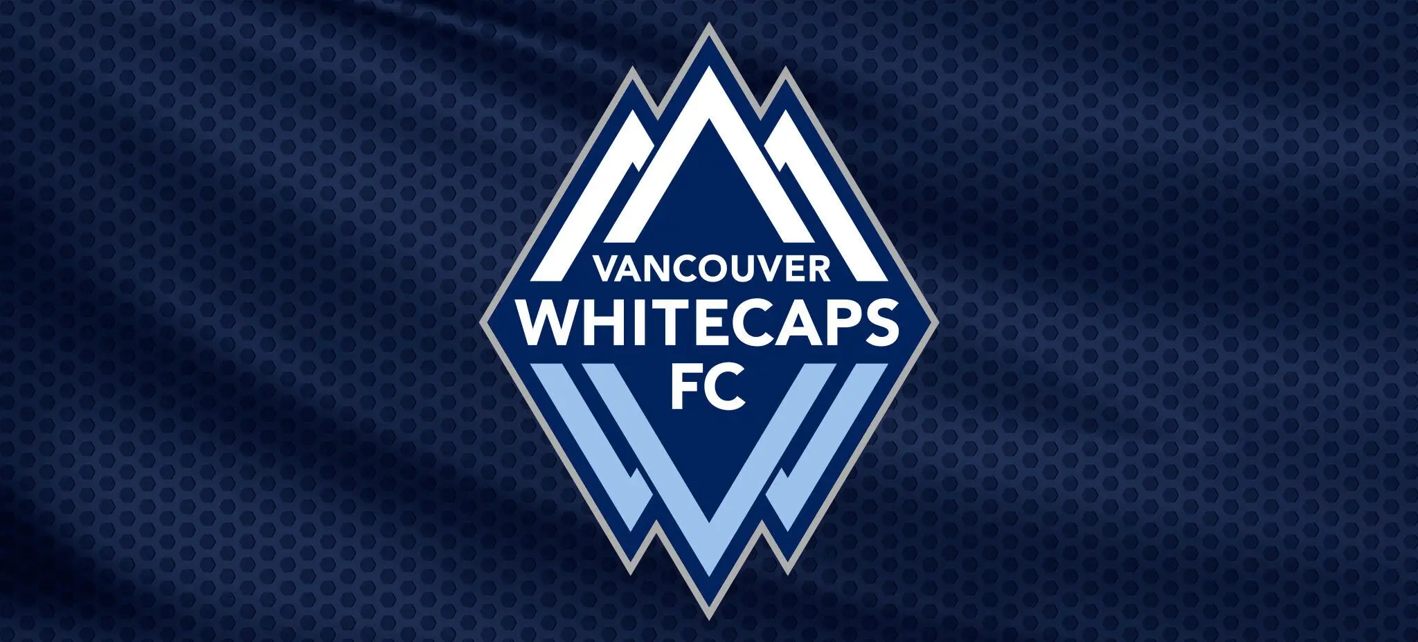 Vancouver Whitecaps FC logo with stylized mountain peaks on a dark blue textured background.