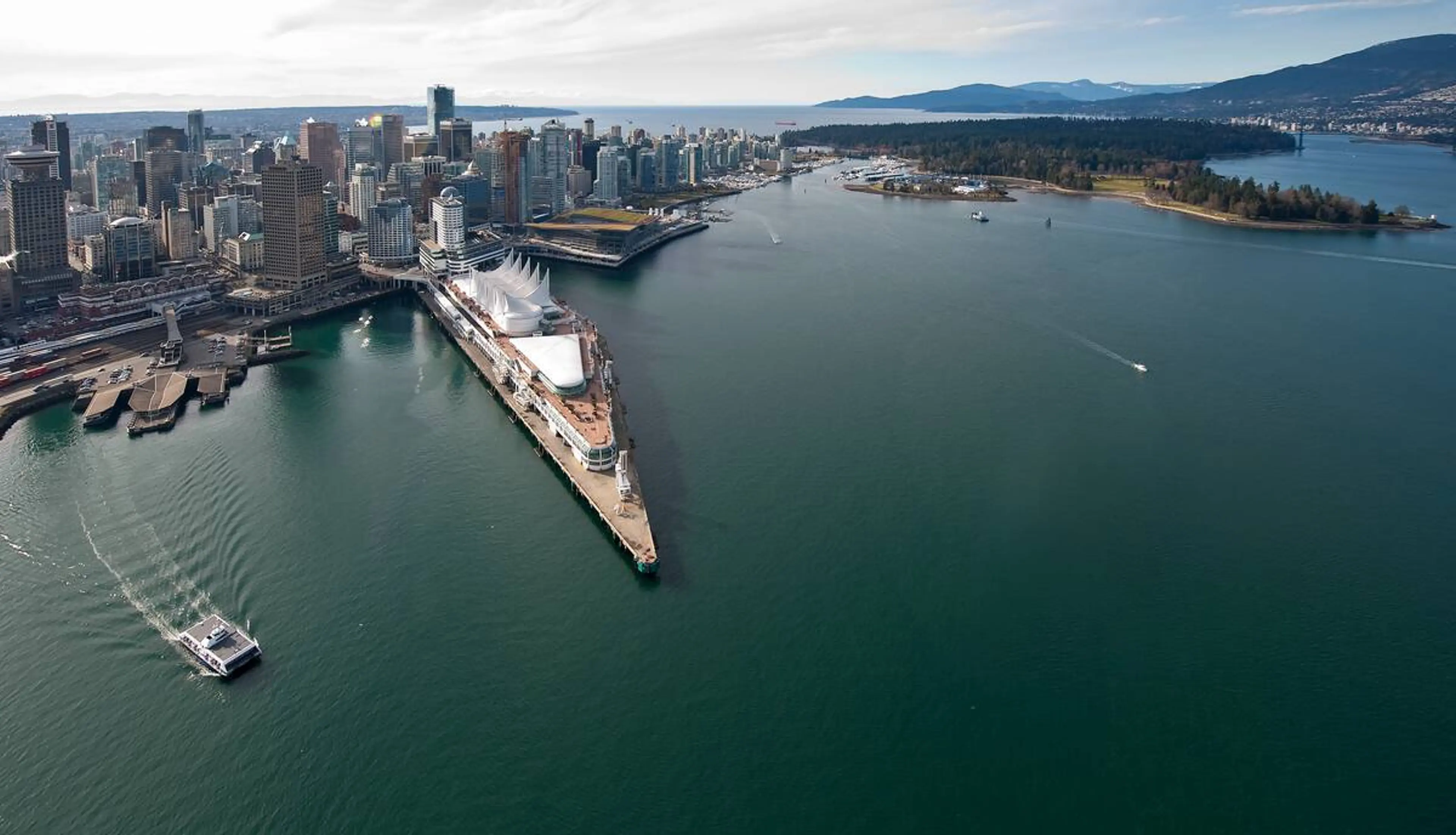 Aerial view of the Seabus making its way across Burrard Inlet. 