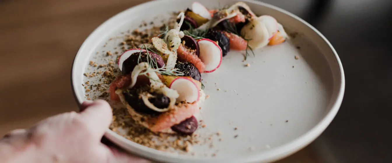 An aesthetically plated dish on a white plate