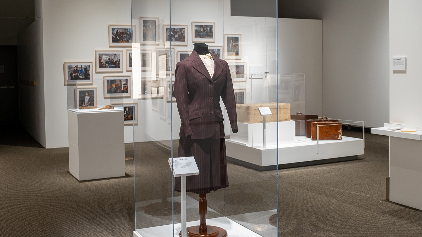 w-1600h-900-4c44de-mov_suitcase_exhibit_011