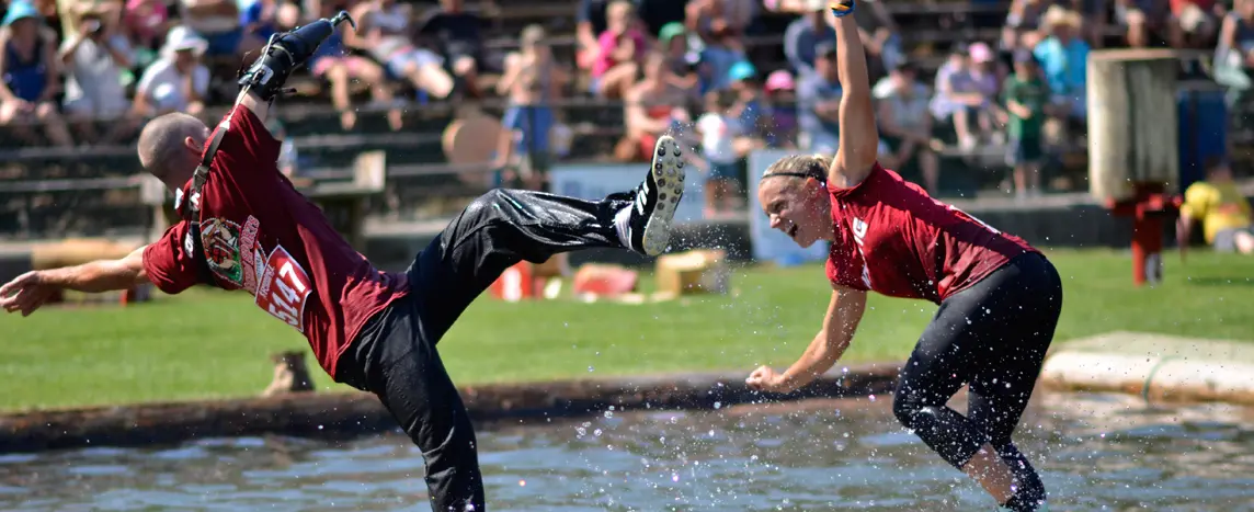 Two people compete in log rolling in Squamish