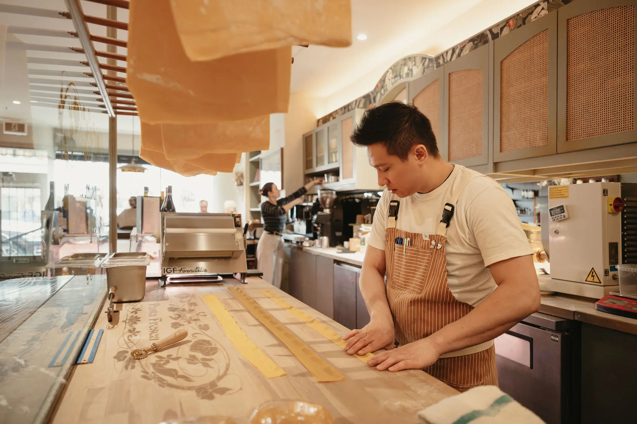 Chef making fresh pasta at Caffè La Tana