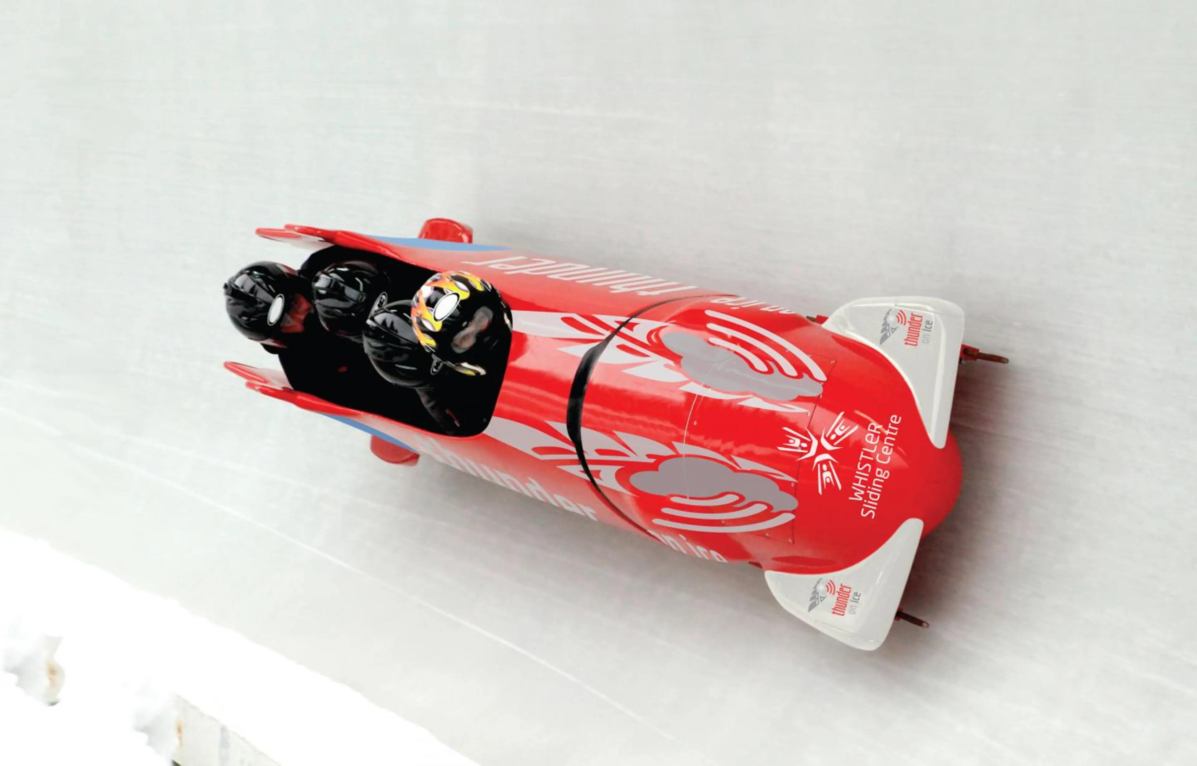 People riding in a bob sled at the Whistler Sliding Centre