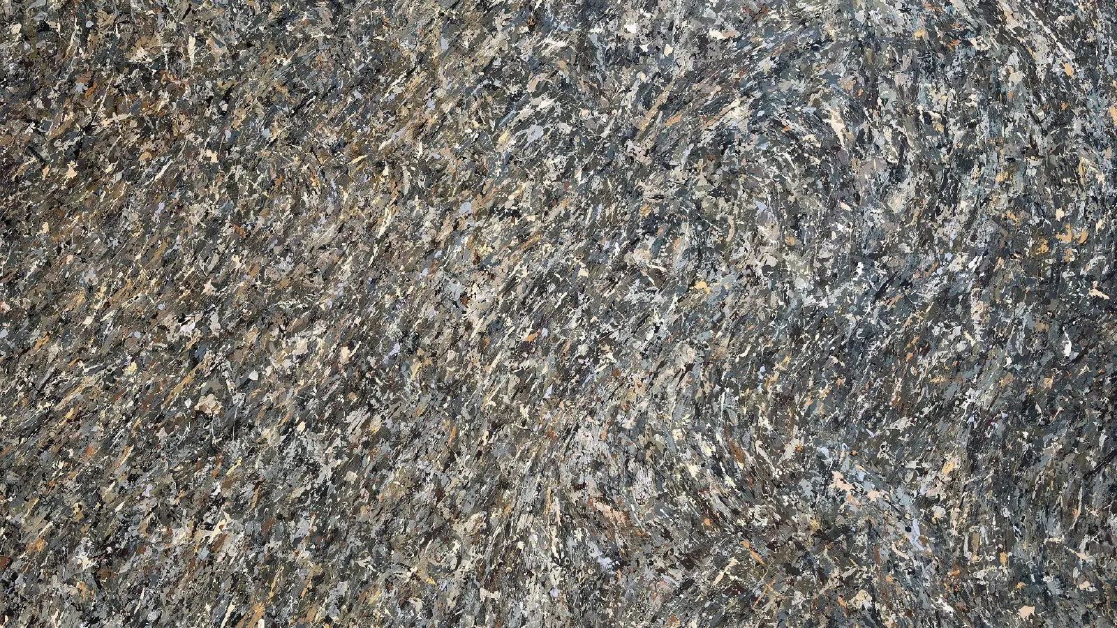 Close-up of a textured surface with swirling patterns in gray, black, white, and beige tones.