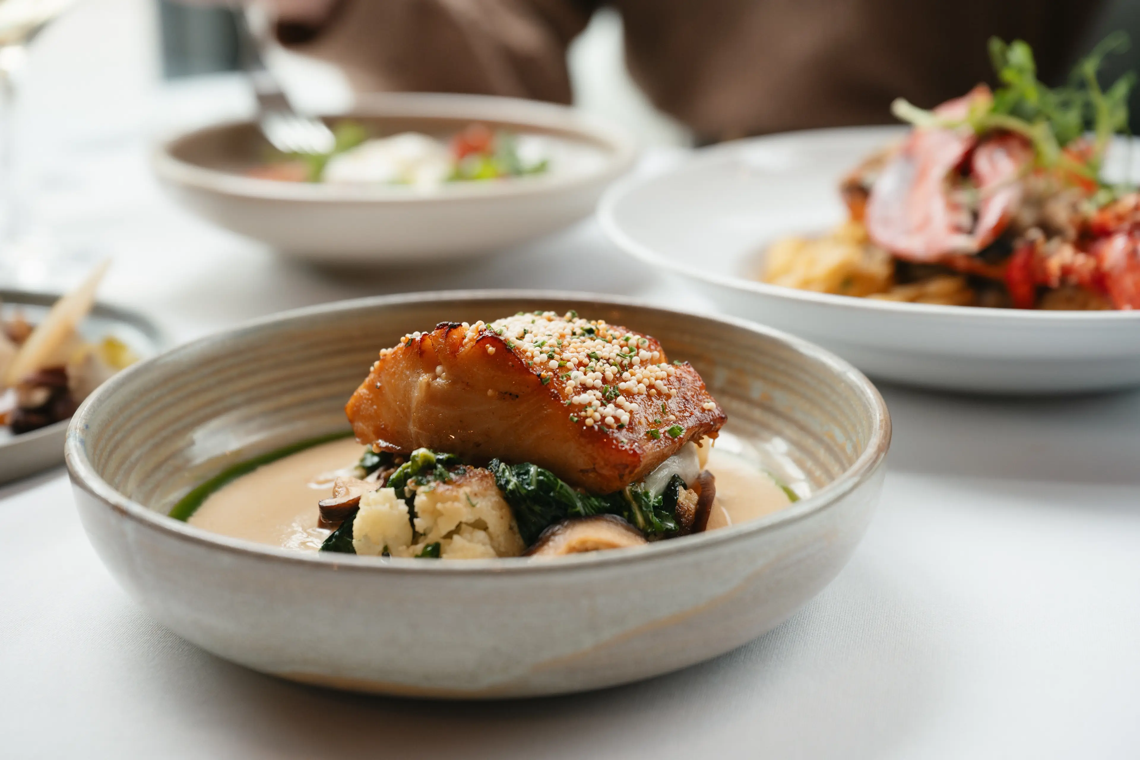 A plate of salmon at a restaurant.