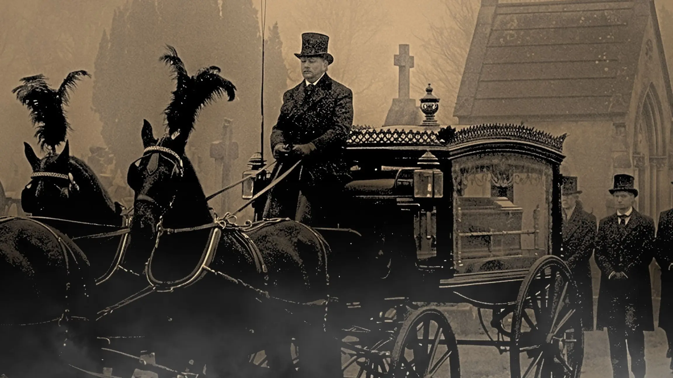 A horse-drawn funeral carriage with two horses and a driver in a top hat, with three people standing nearby in formal attire.