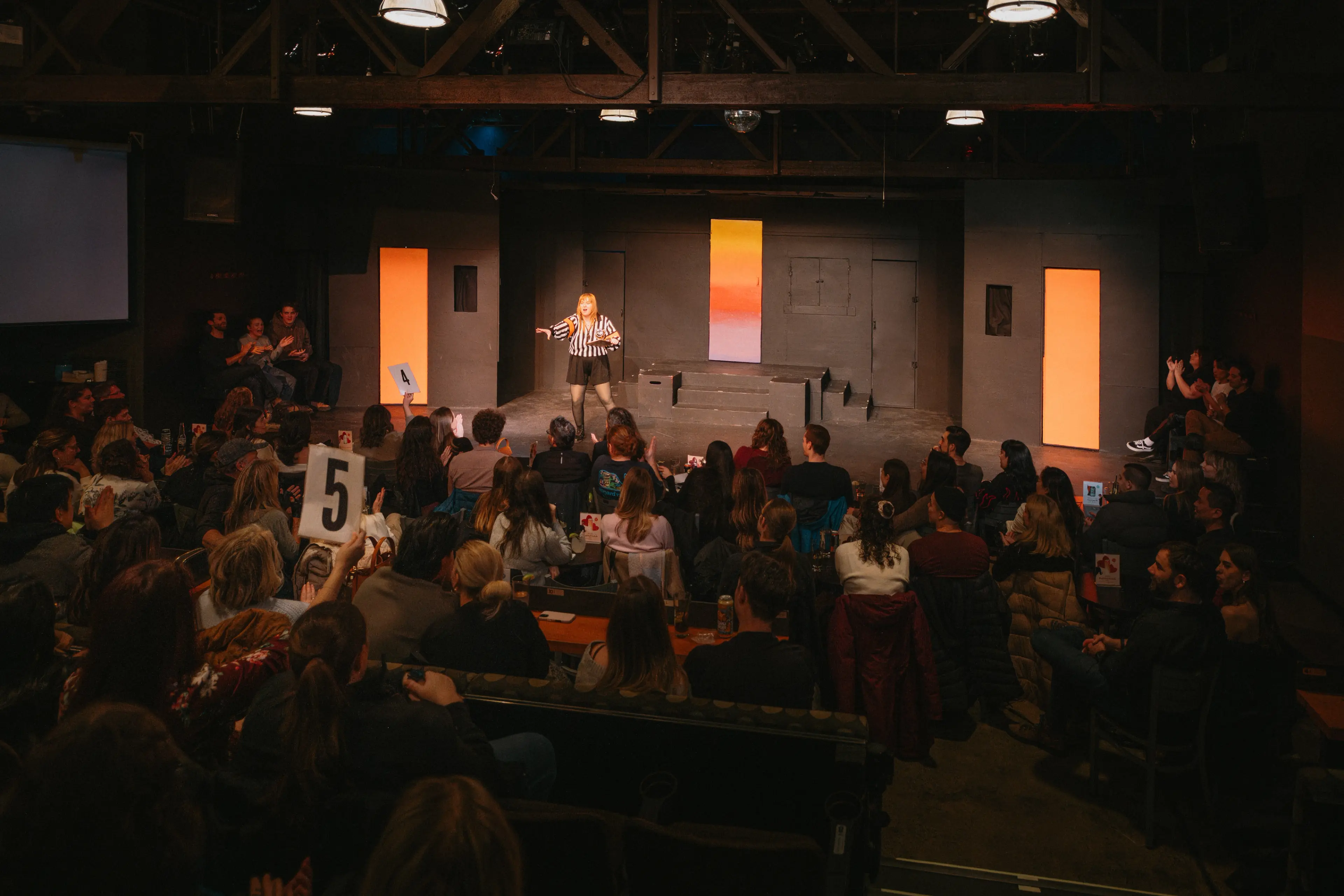 Crowds enjoying a show at the Improv Theater, Granville Island in Vancouver.