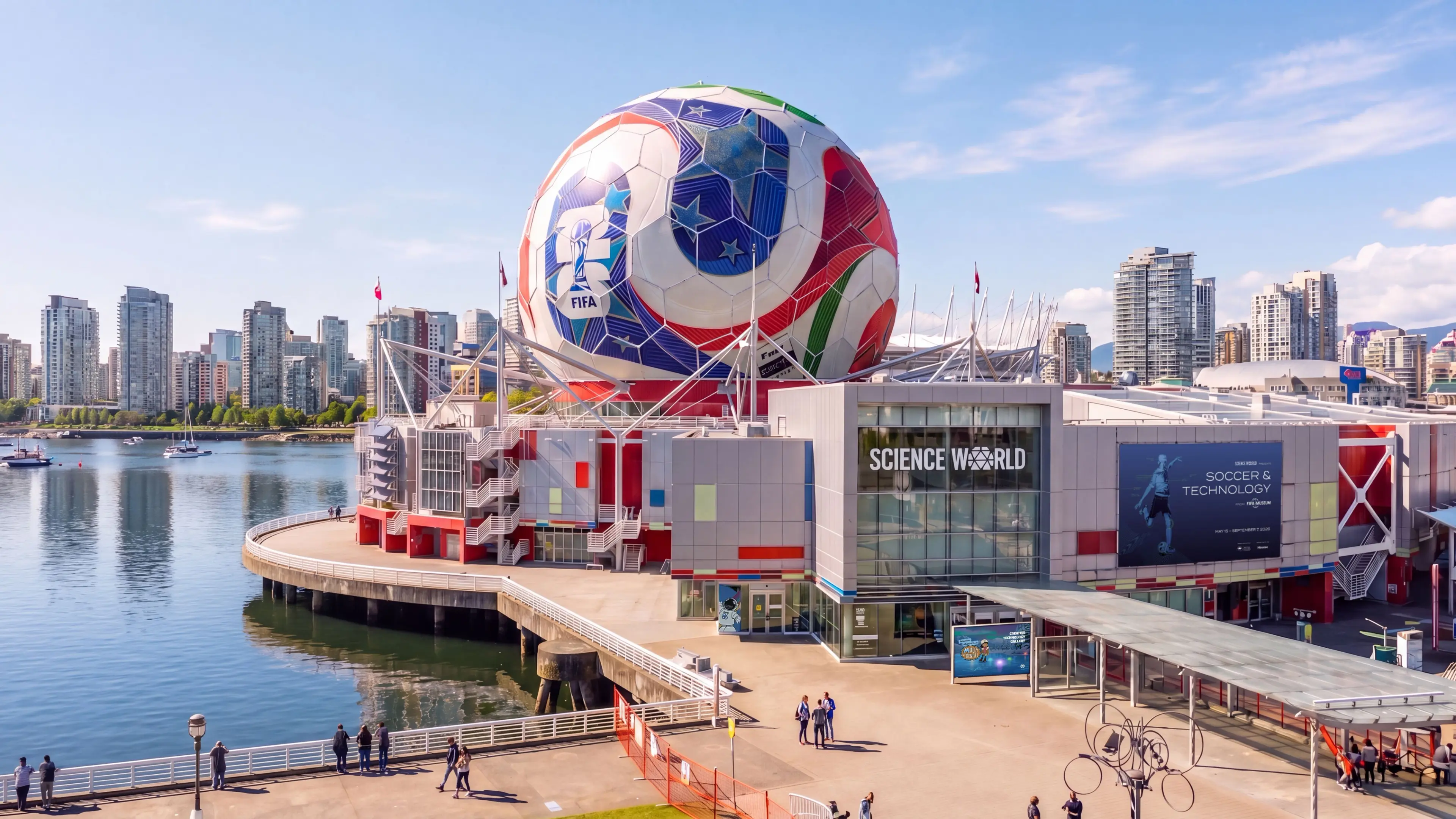 Science World building with a giant soccer ball on top, waterfront, and city skyline in the background.