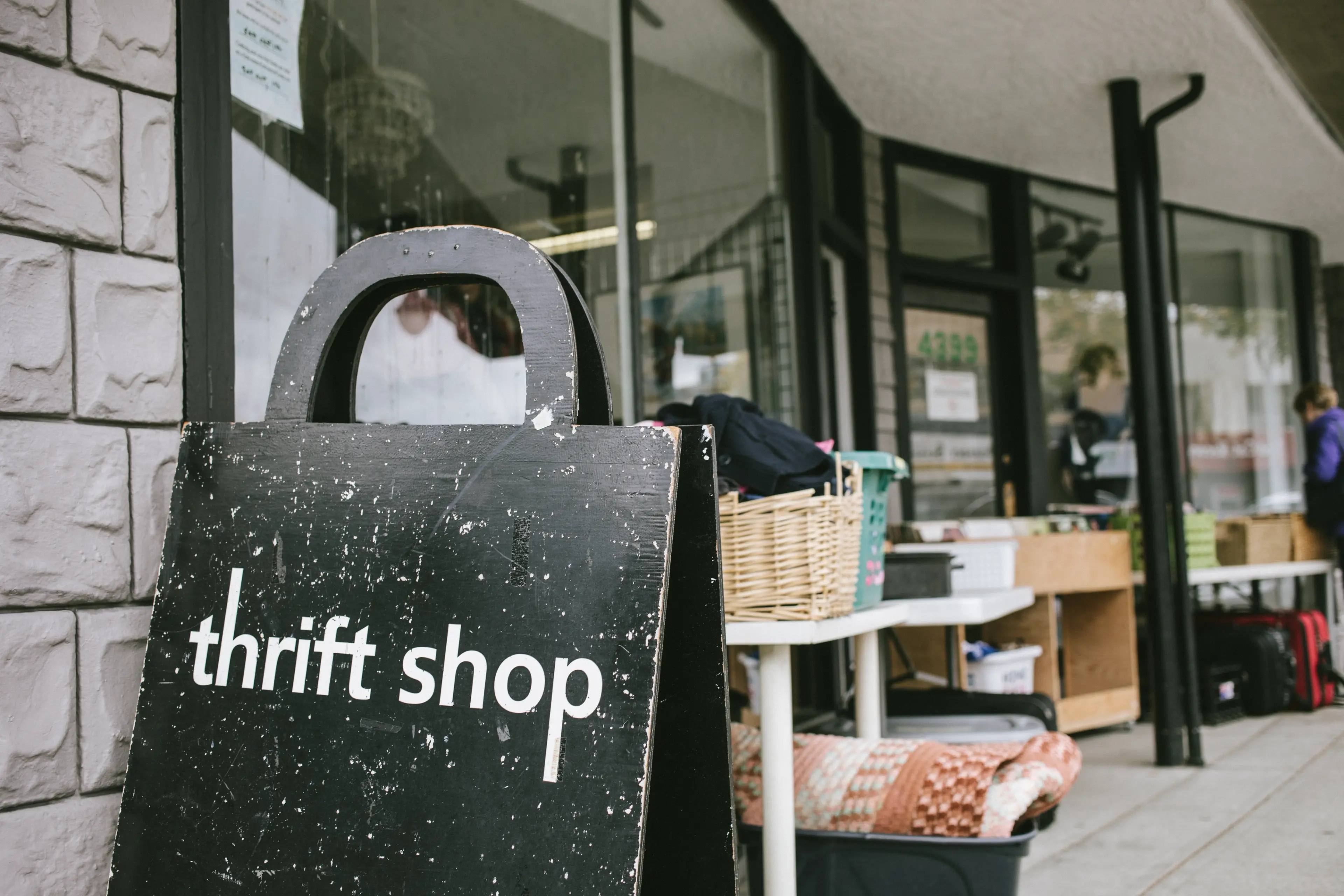 Photo of a sign at a thrift shop in Vancouver.