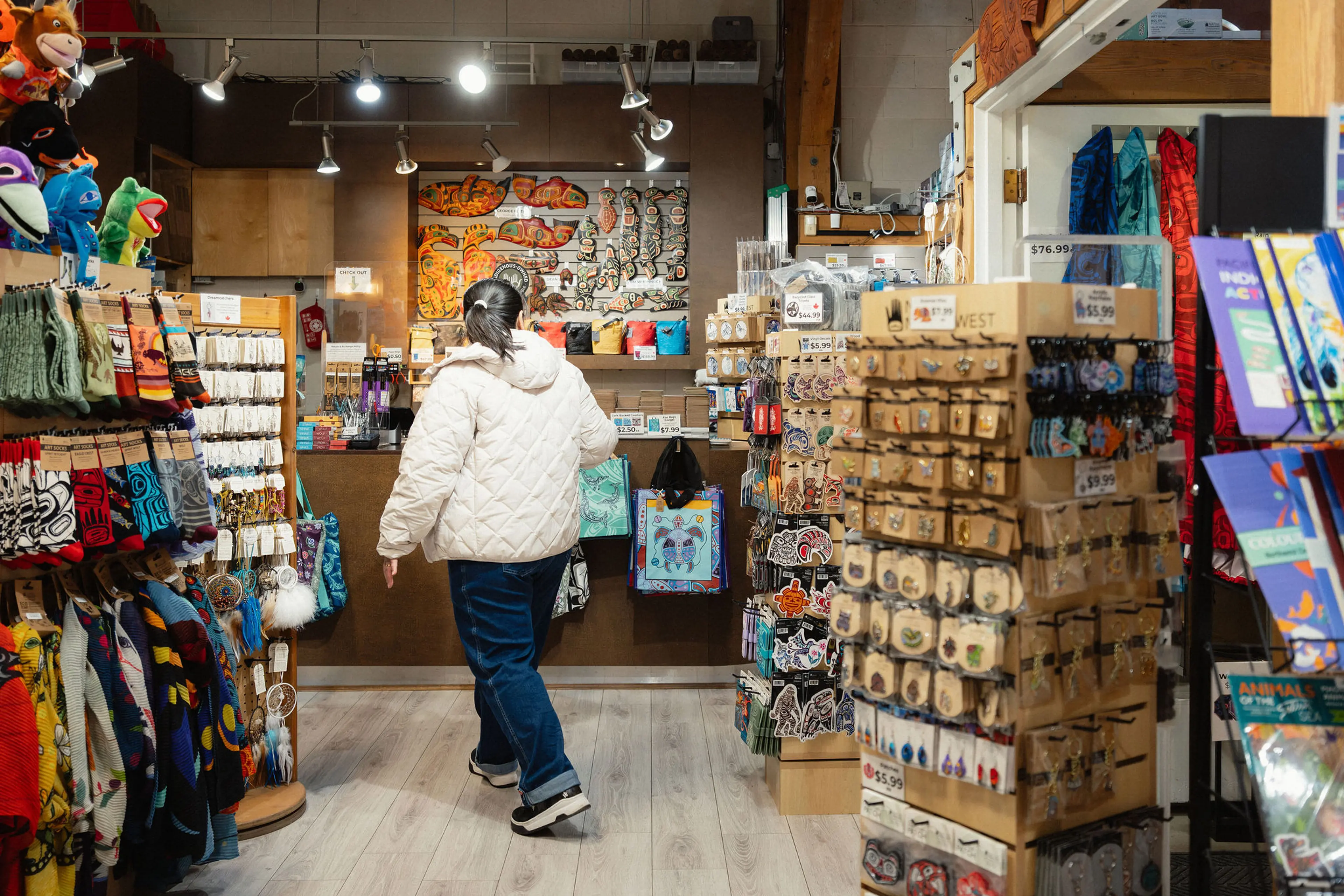 A customer shopping at the Wickaninnish Gallery in Vancouver.